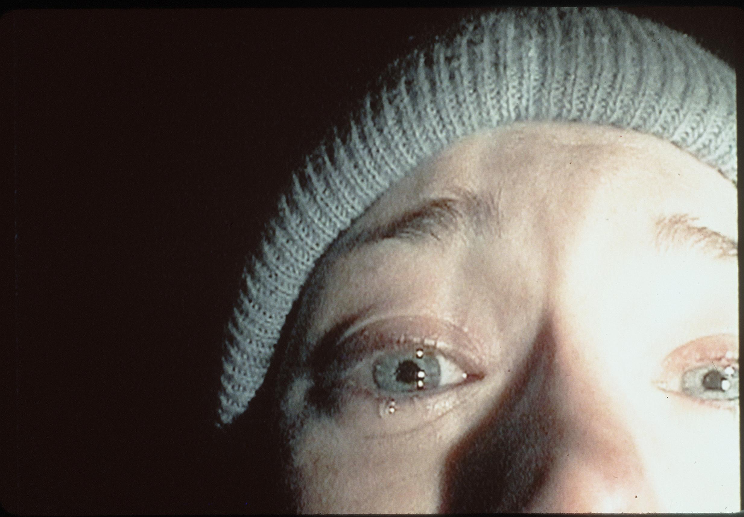 Heather Donahue's eyes and nose in a shot from The Blair Witch Project.