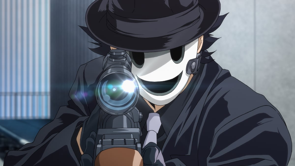 Yuka Makoto aka Sniper Mask wearing a black suit in 