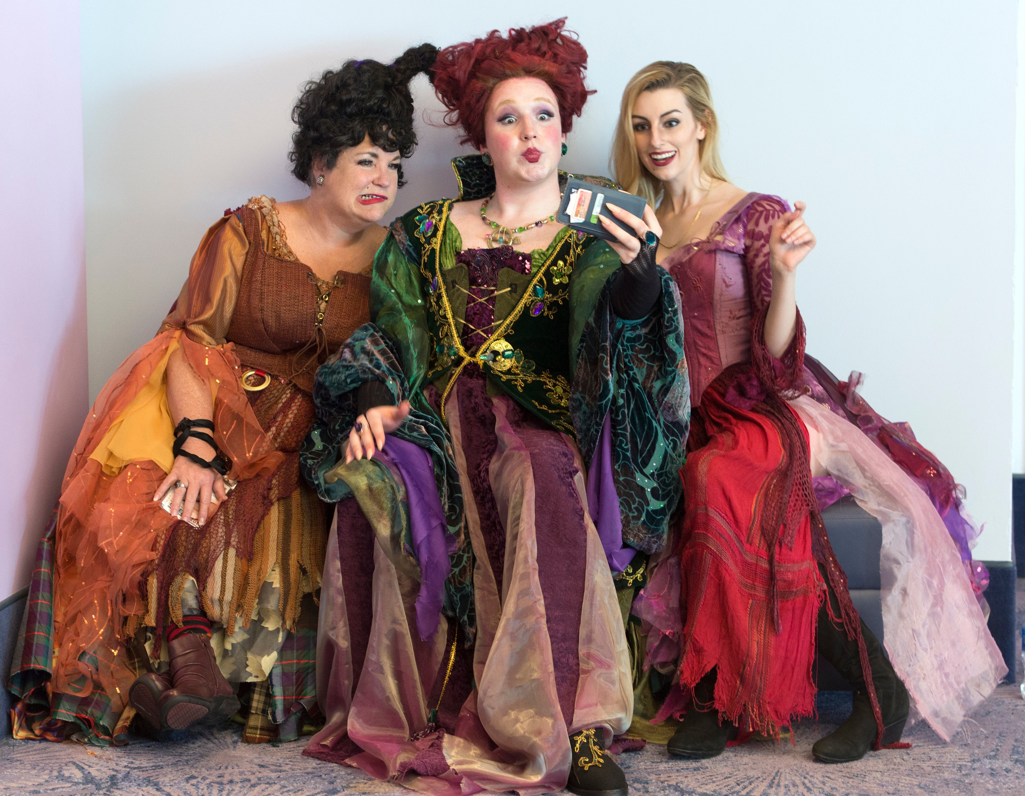 cosplay actors dressed as the hocus pocus sanderson sisters