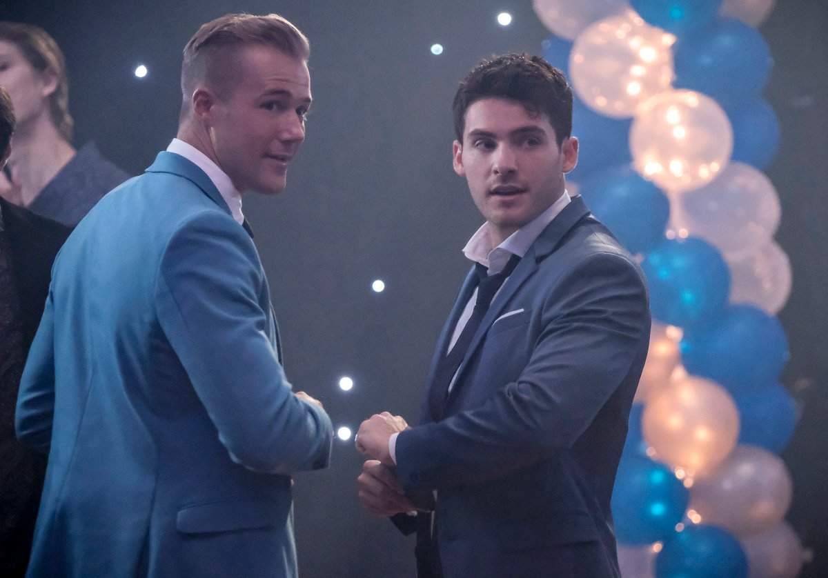 Hunter Clowdus, and Cody Christian dressed in suits at 'All American' Season 1.