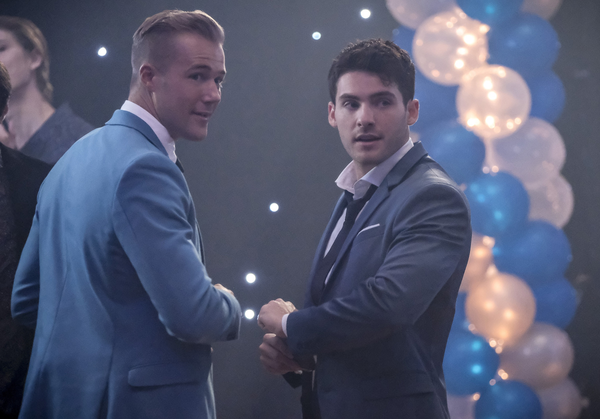 Hunter Clowdus, and Cody Christian dressed in suits at 'All American' Season 1.