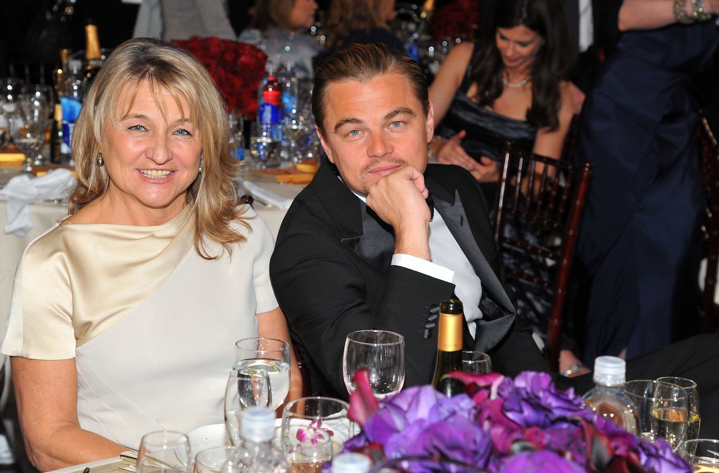 Leonardo DiCaprio sits at a table next to his mother, Irmelin Indenbirken, at the 2012 Golden Globes