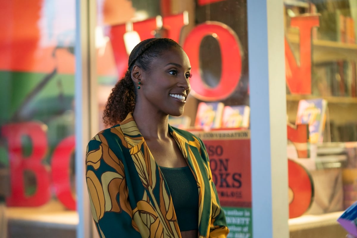 Issa Rae standing in front a book store in 'Insecure' Season 5.