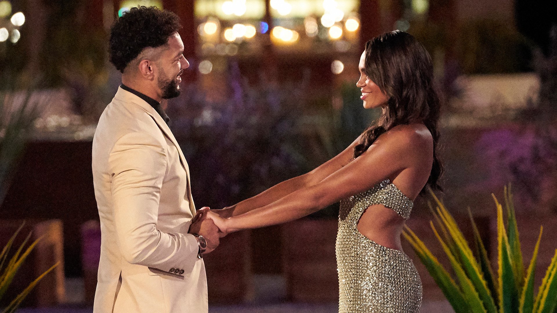 Jamie Skaar and Michelle Young holding hands together in ‘The Bachelorette’ Season 18 premiere