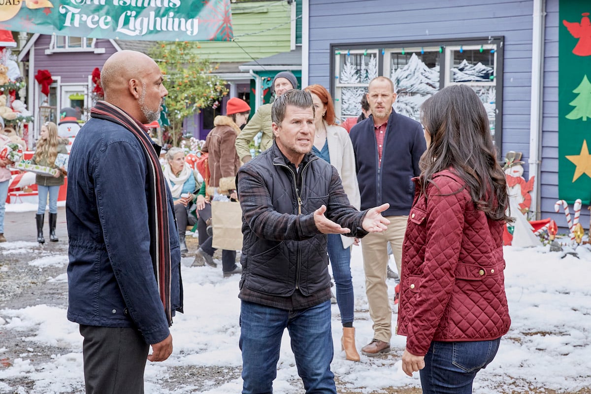 Jason Hervey gesturing at Danica McKellar in 'You, Me & The Christmas Trees'