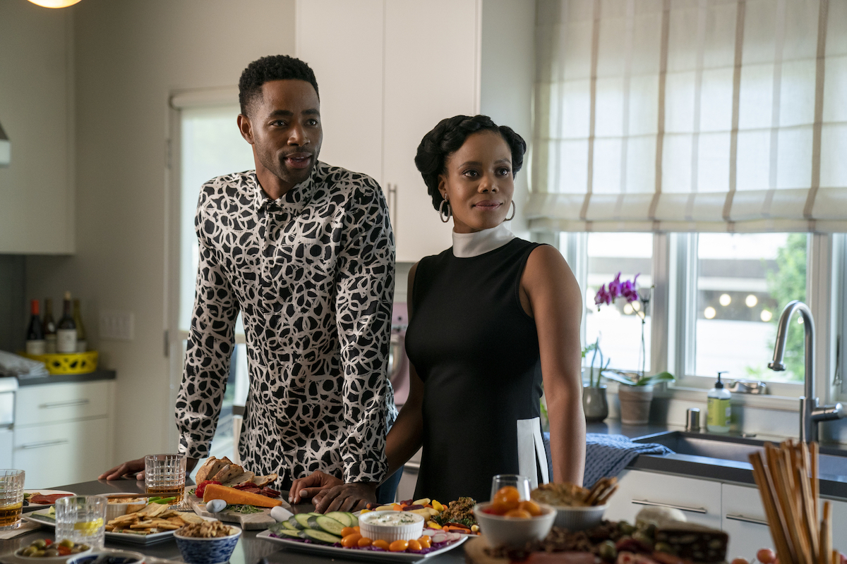 Jay Ellis, and Christina Ellmore standing at a kitchen table in 'Insecure' Season 4.