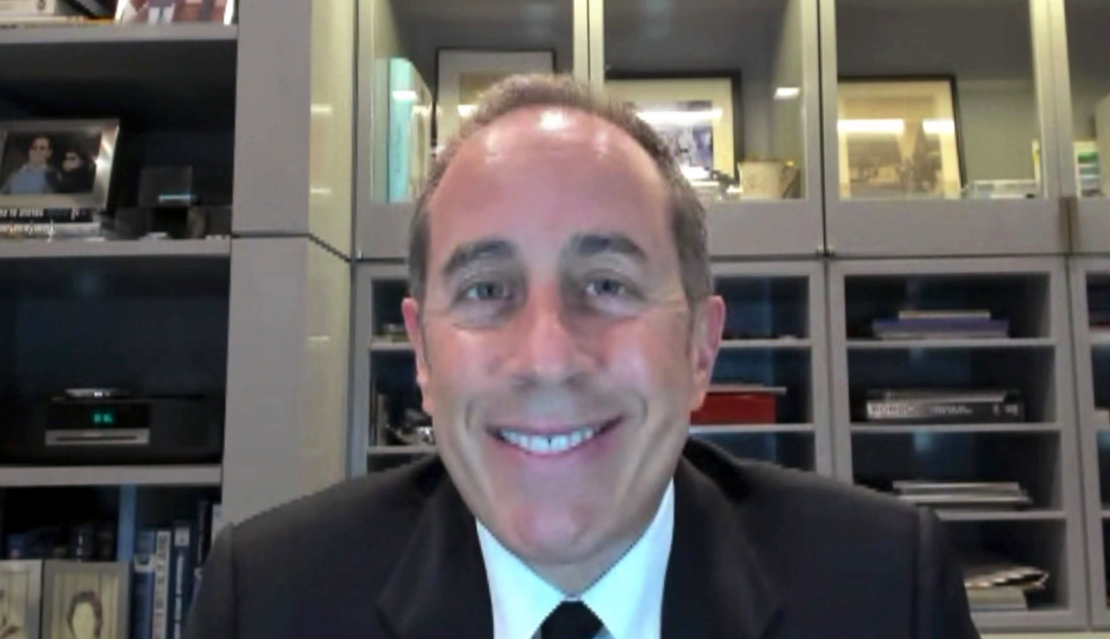 Jerry Seinfeld wears a suit on Zoom