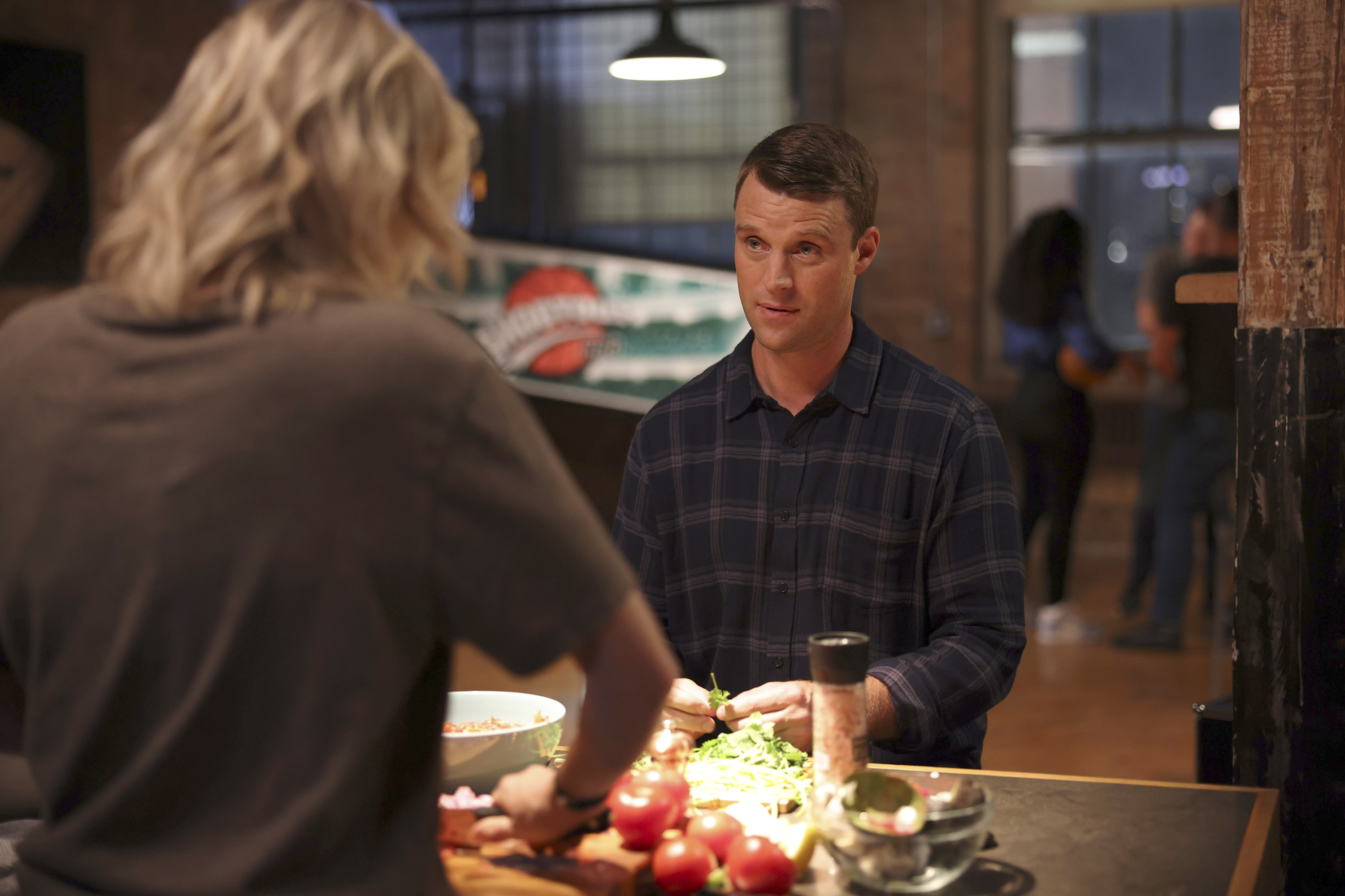 Matt Casey (Jesse Spencer) talking to a person with blond hair in 'Chicago Fire'