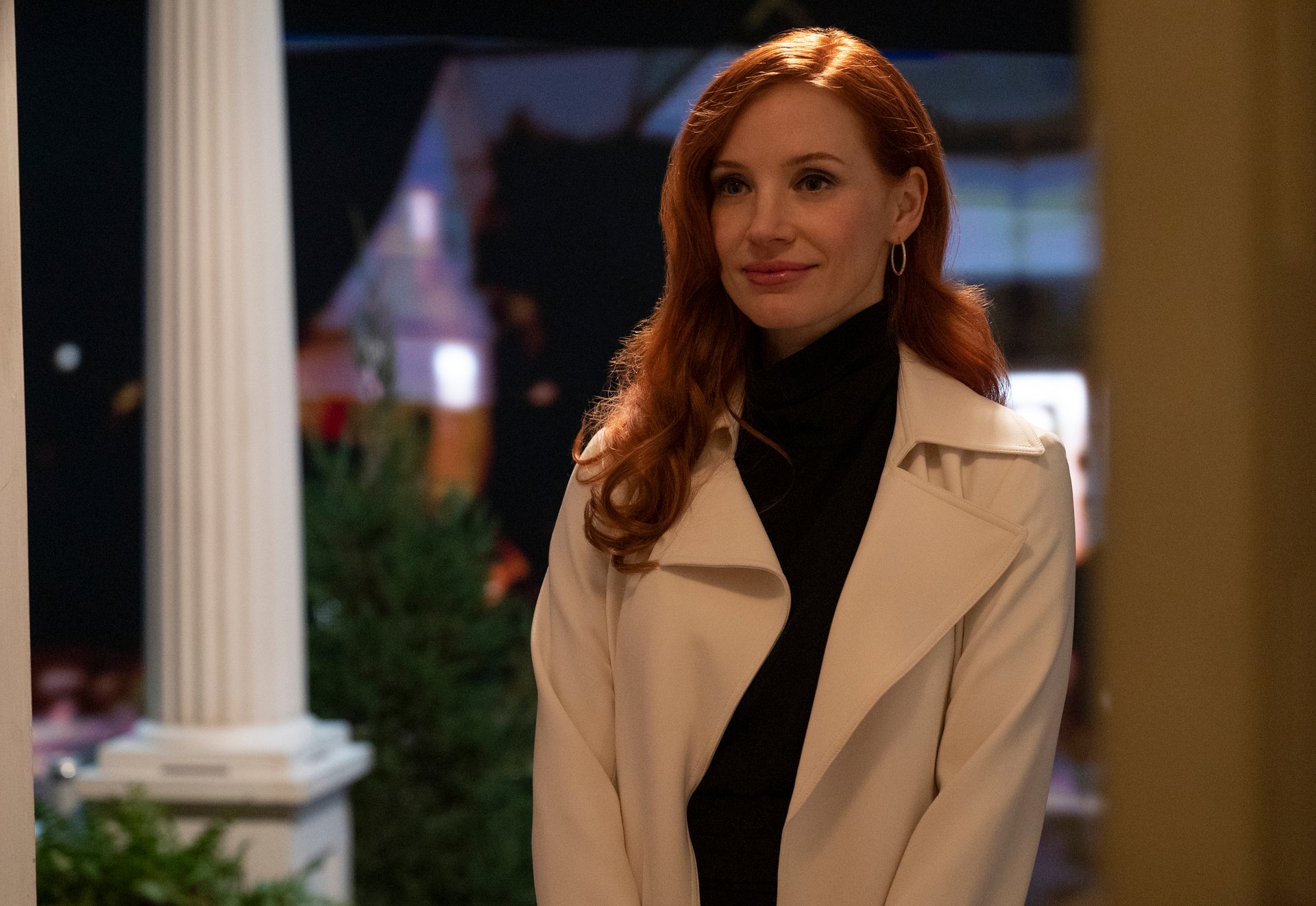 For our article about her 1 condition for doing nude scenes, Jessica Chastain as Mira in HBO Max's 'Scenes From a Marriage.' She's wearing a white coat and her red hair is down.