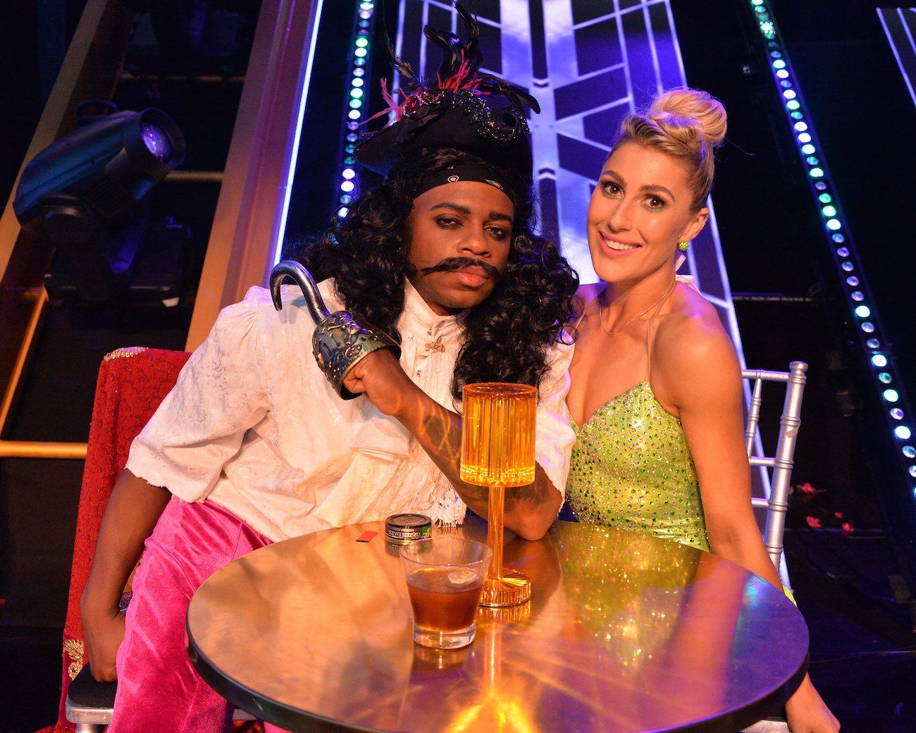Jimmie Allen in a Captain Hook costume sitting next to his 'Dancing with the Stars' pro partner Emma Slater, who is dressed as Tinkerbell