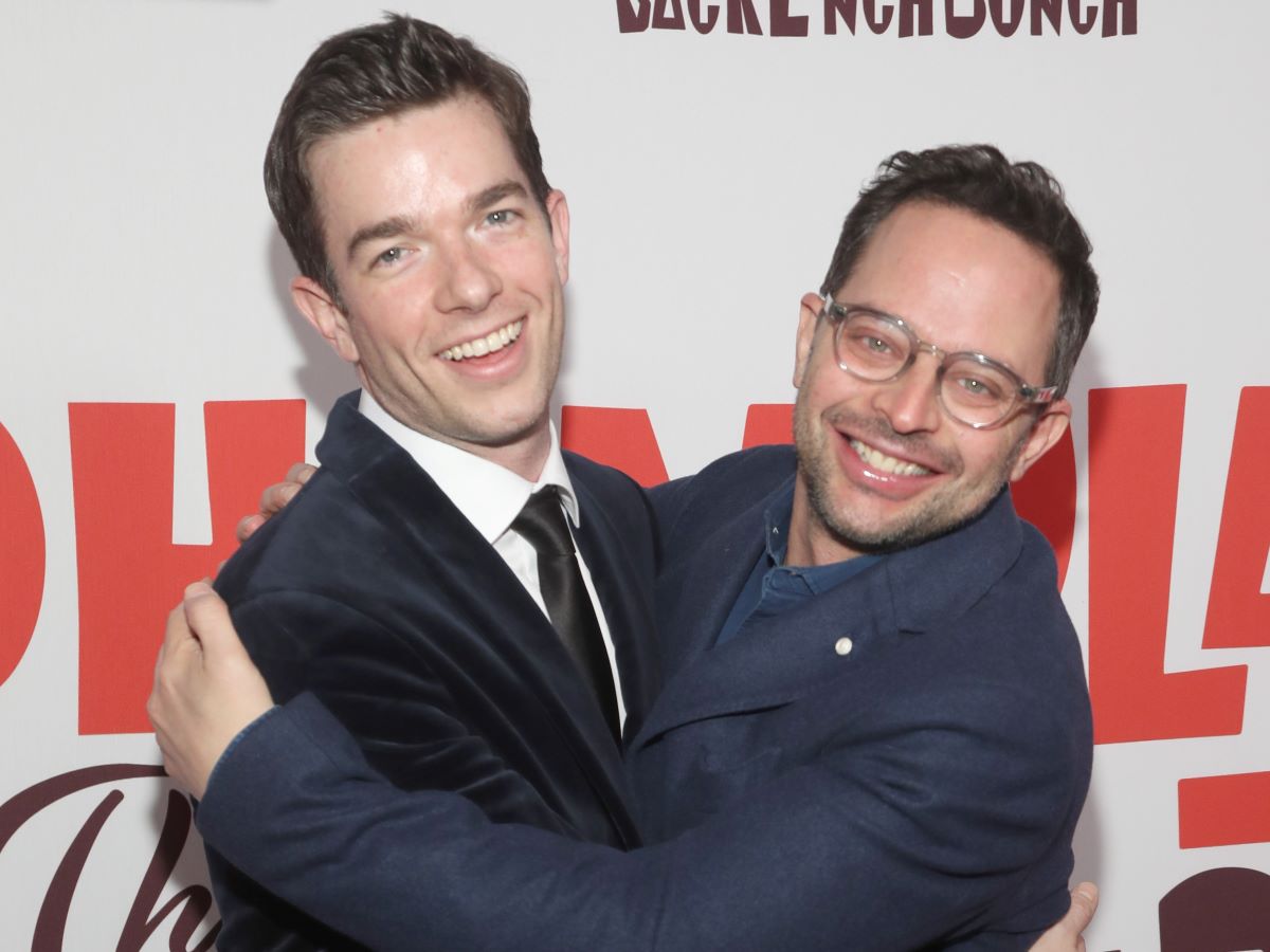 John Mulaney and Nick Kroll share an embrace and smile for the camera