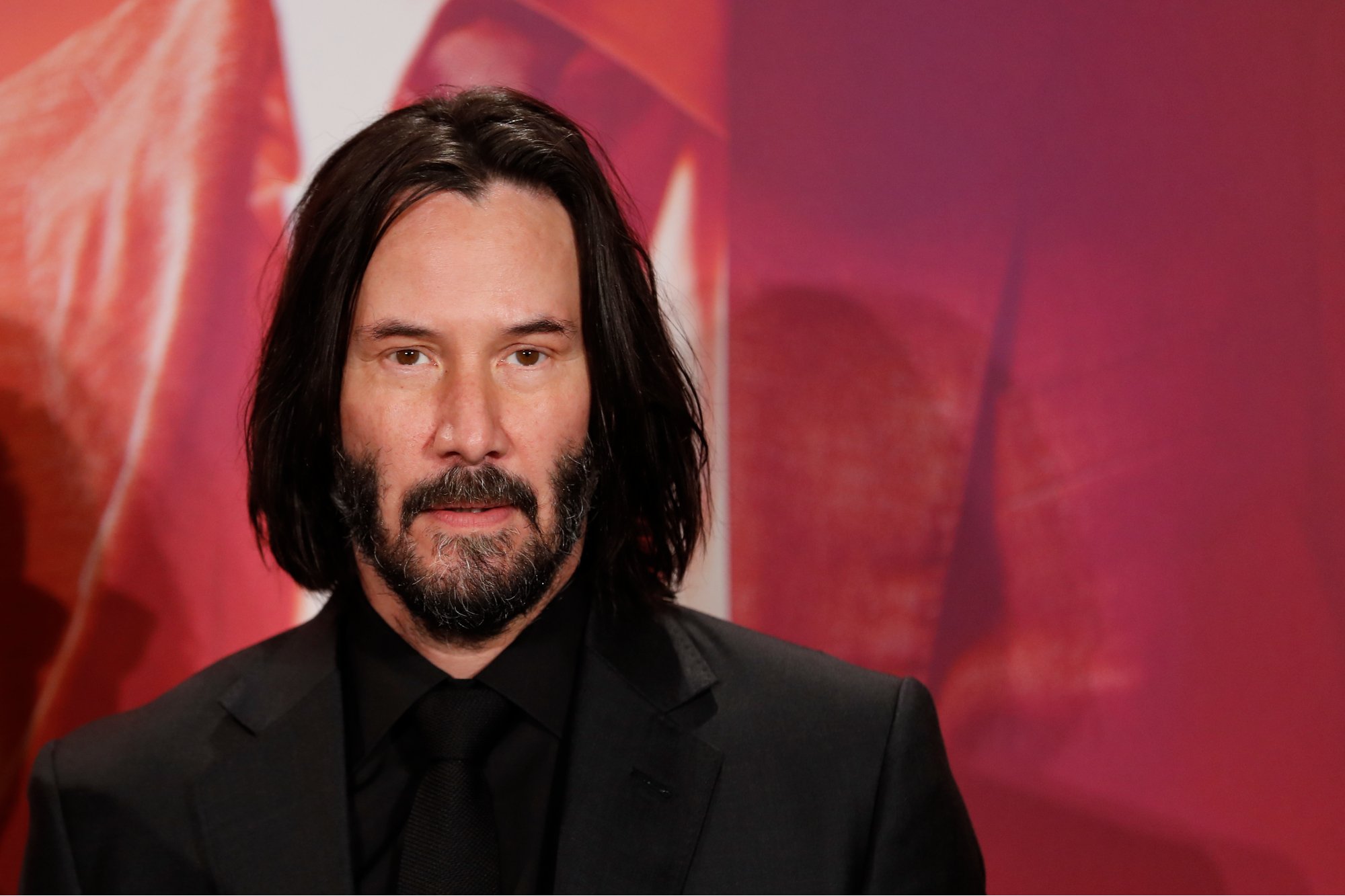 'John Wick 4' star Keanu Reeves wearing a black suit at the 'John Wick Chapter 3' photocall