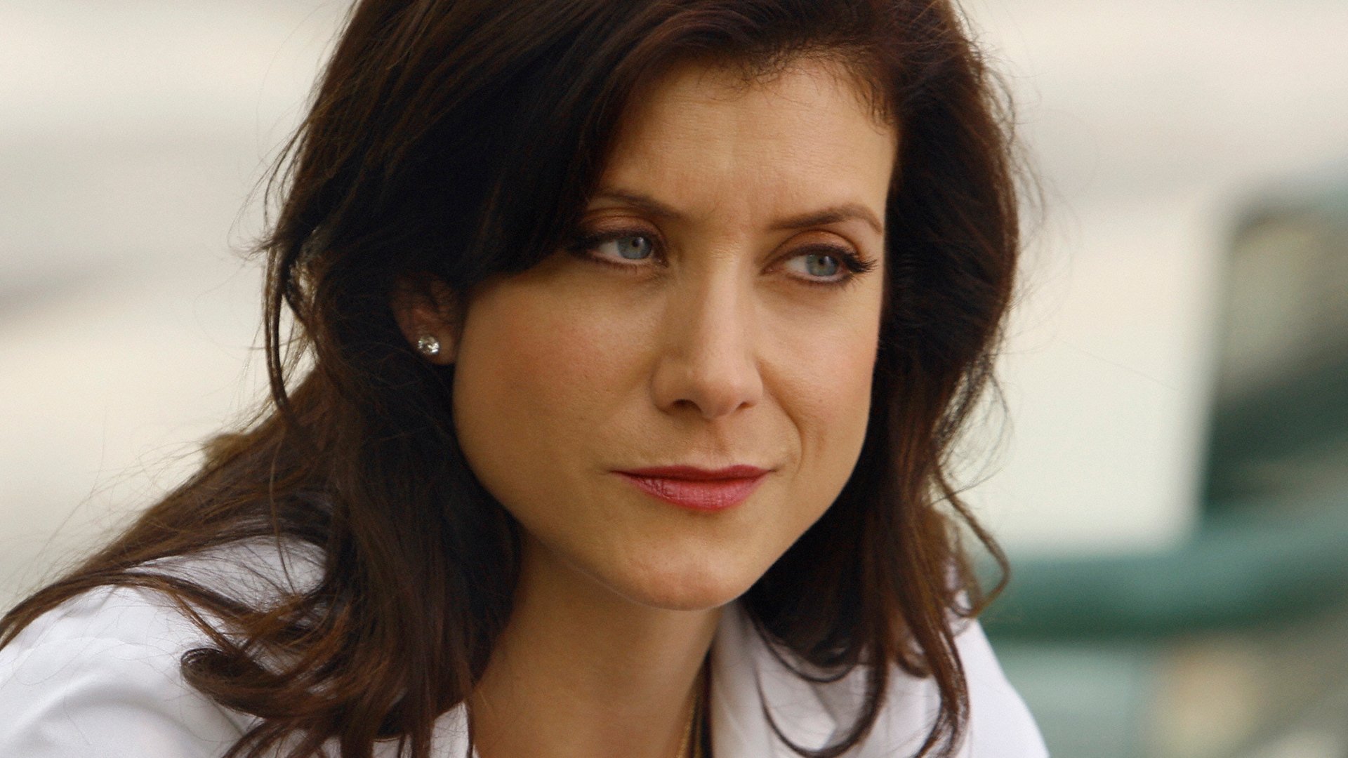 Kate Walsh as Addison Montgomery smirking in ‘Grey’s Anatomy’