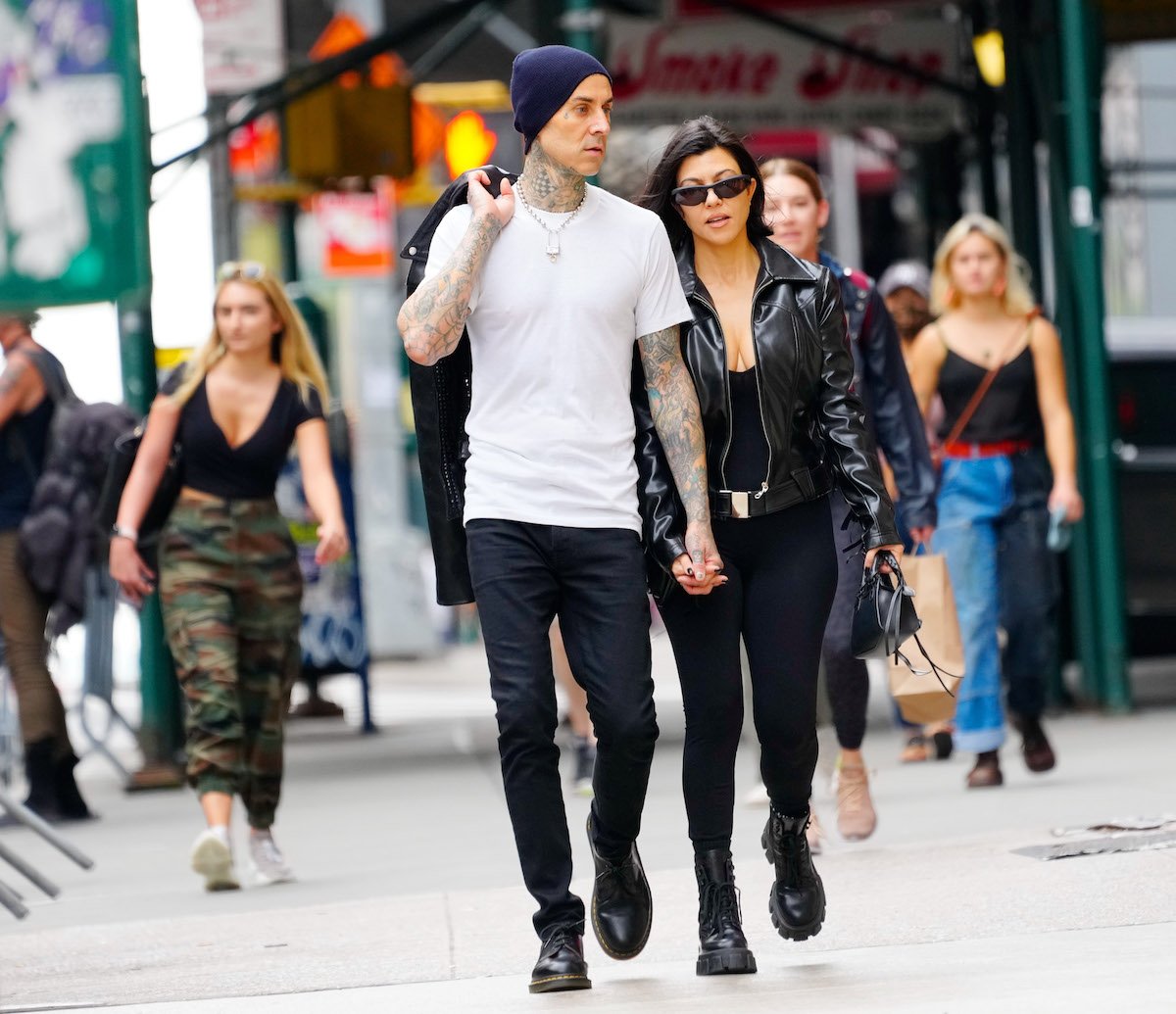 Kourtney Kardashian and Travis Barker walk around New York City hand in hand