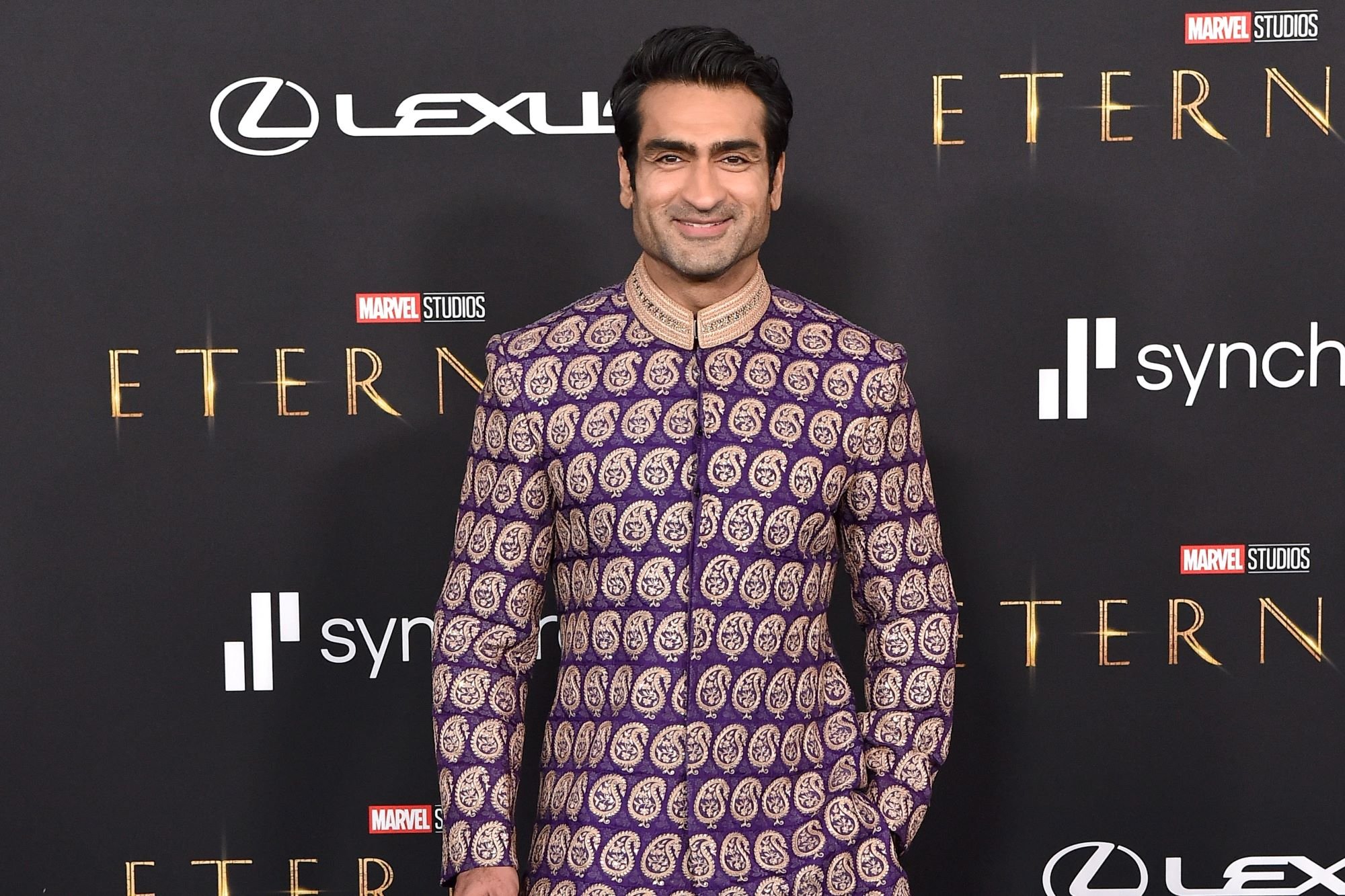 Marvel's 'Eternals' star Kumail Nanjiani wears a traditional purple-and-gold Pakistani sherwani.