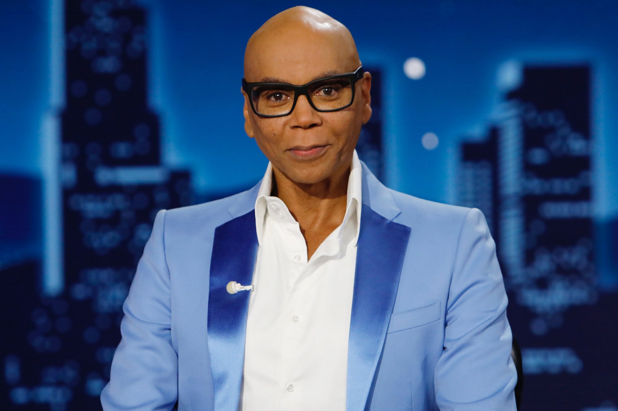 LGBTQ 'RuPaul's Drag Race' creator RuPaul Charles hosting 'Jimmy Kimmel Live!' wearing a blue blazer and a white collared shirt