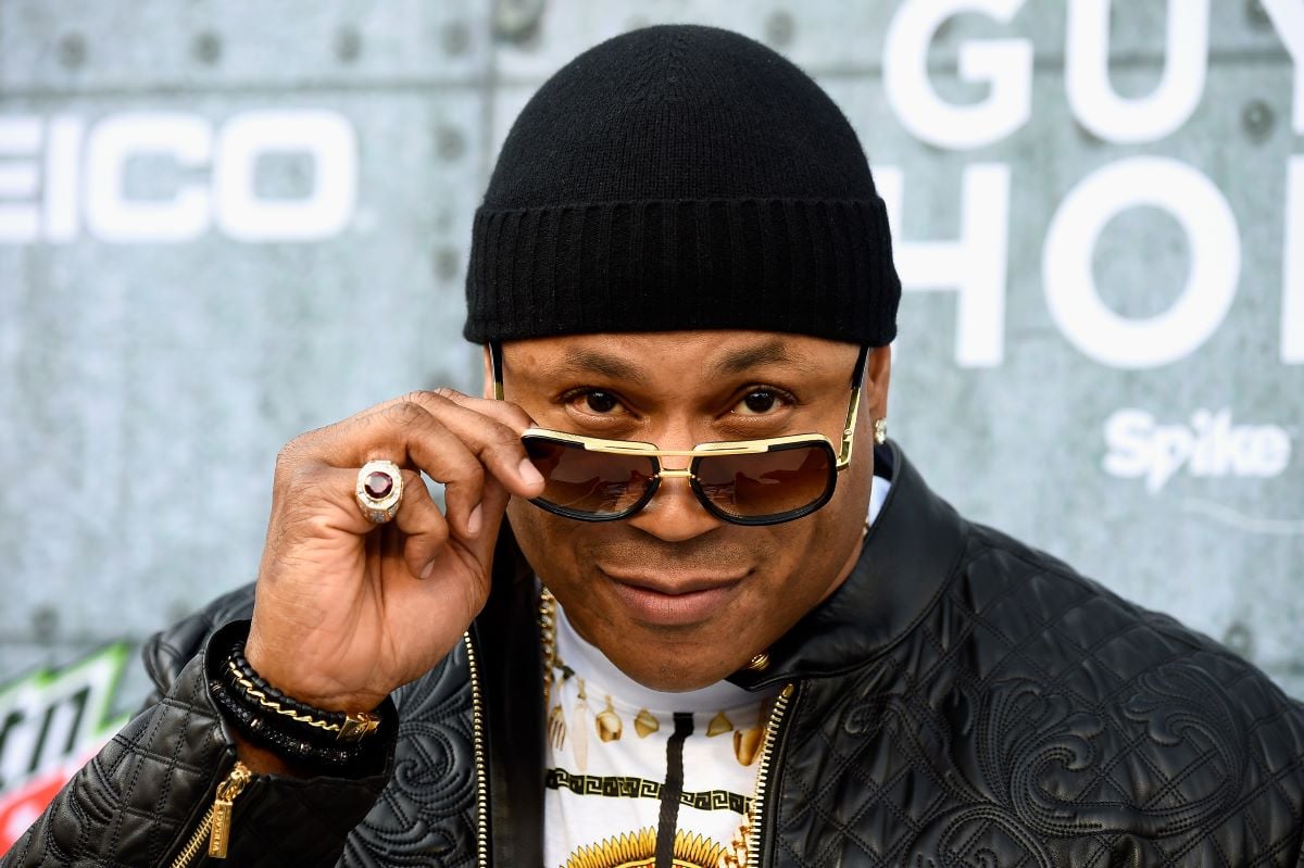 LL Cool J in a black beanie looking over the top of his sunglasses