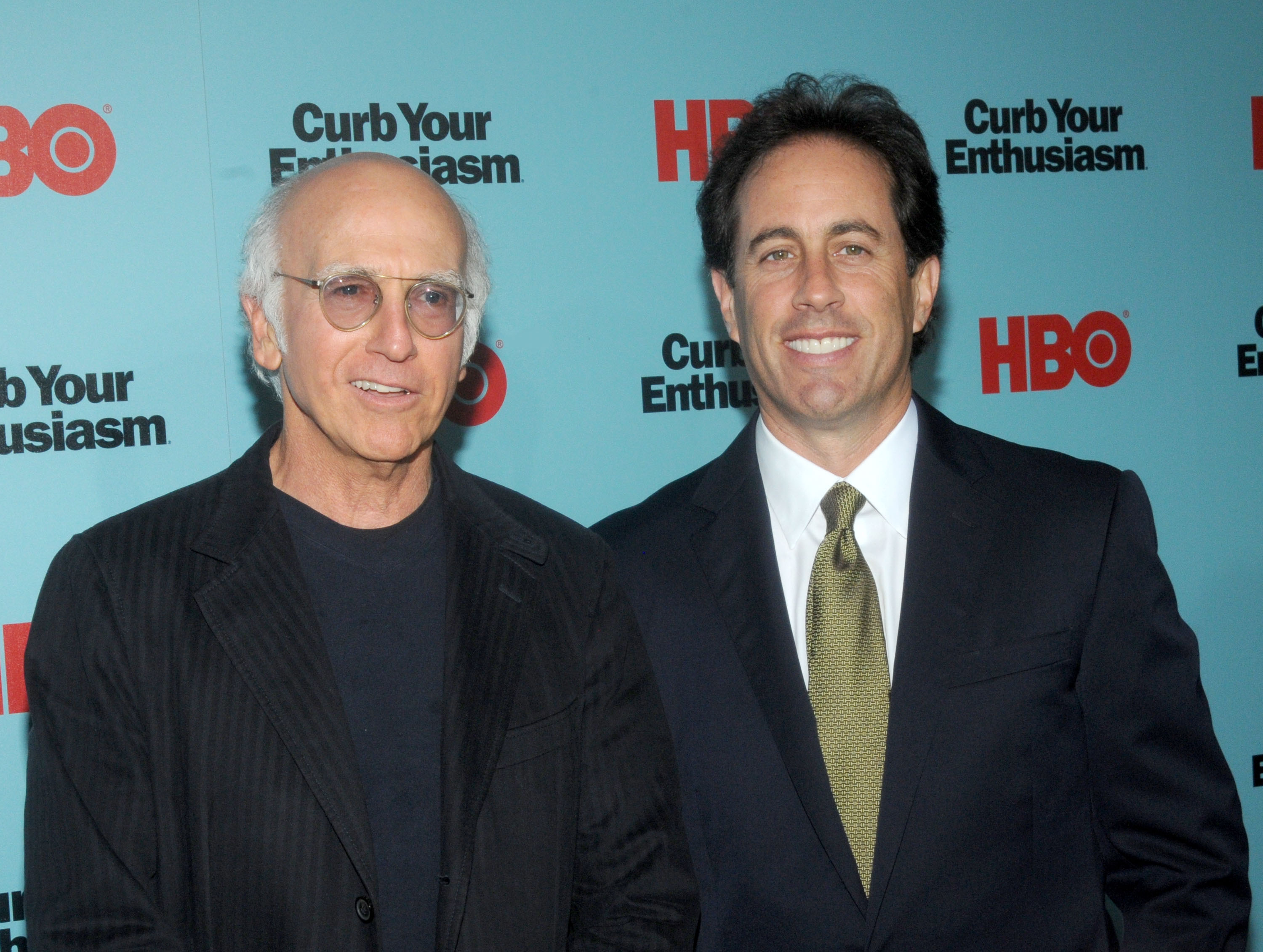 Larry David and Jerry Seinfeld for 'Seinfeld' TV show wearing blazers for photo op.