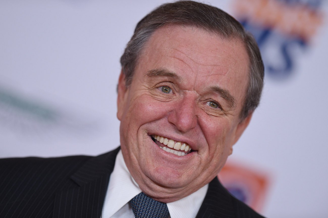 Jerry Mathers smiles as he walks the red carpet