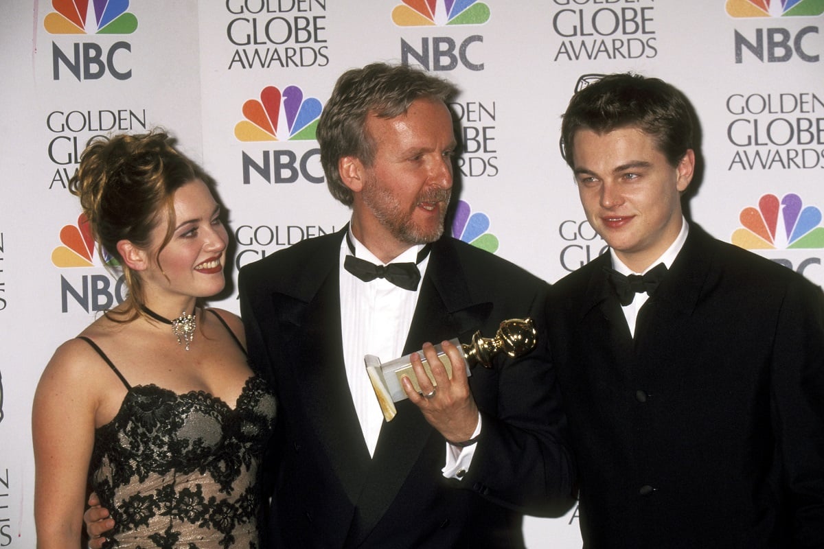 Leonardo DiCaprio, James Cameron, and Kate Winslet all smiling.