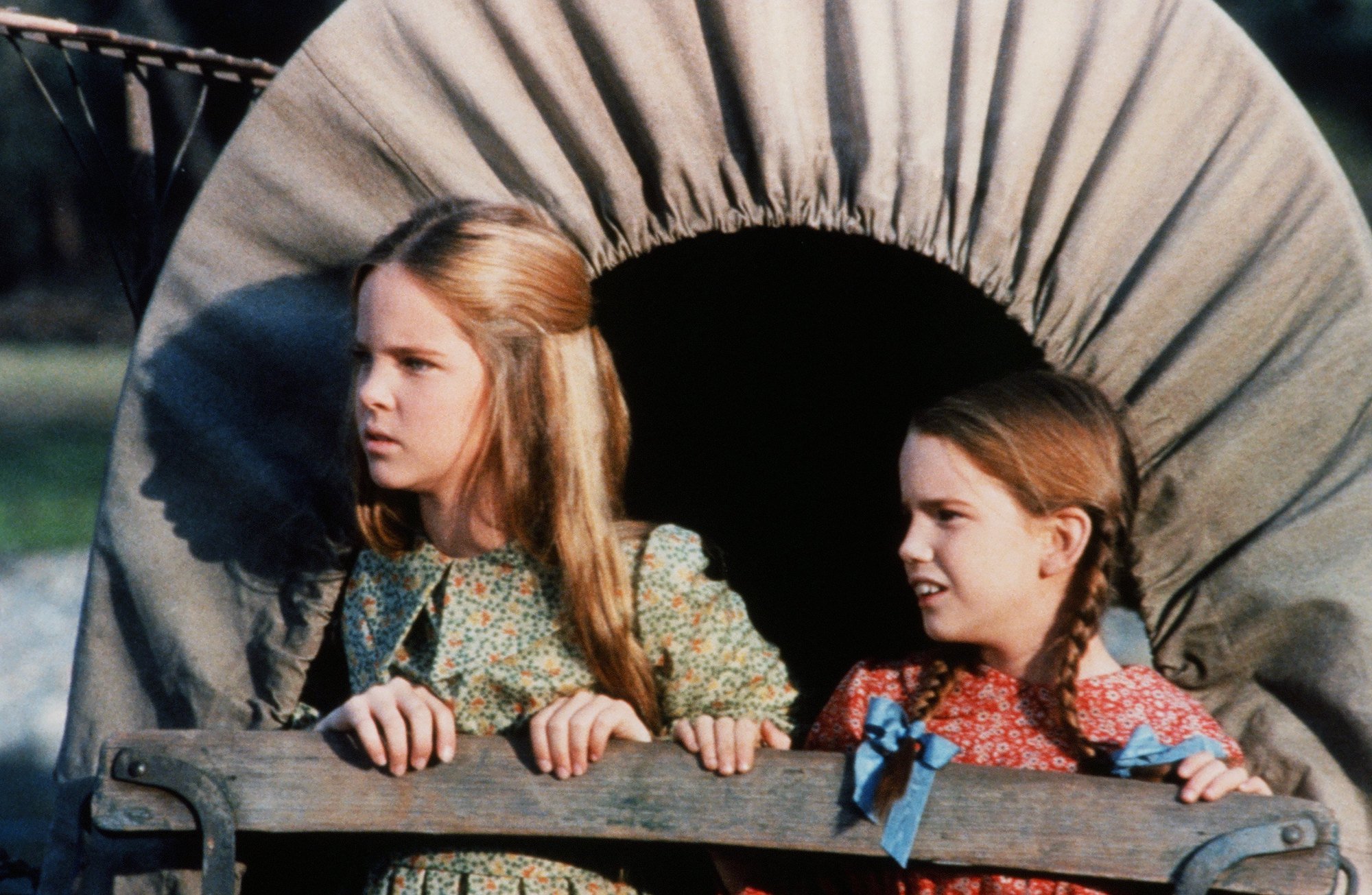 Little House on the Prairie: Melissa Sue Anderson and Melissa Gilbert ride in a covered wagon