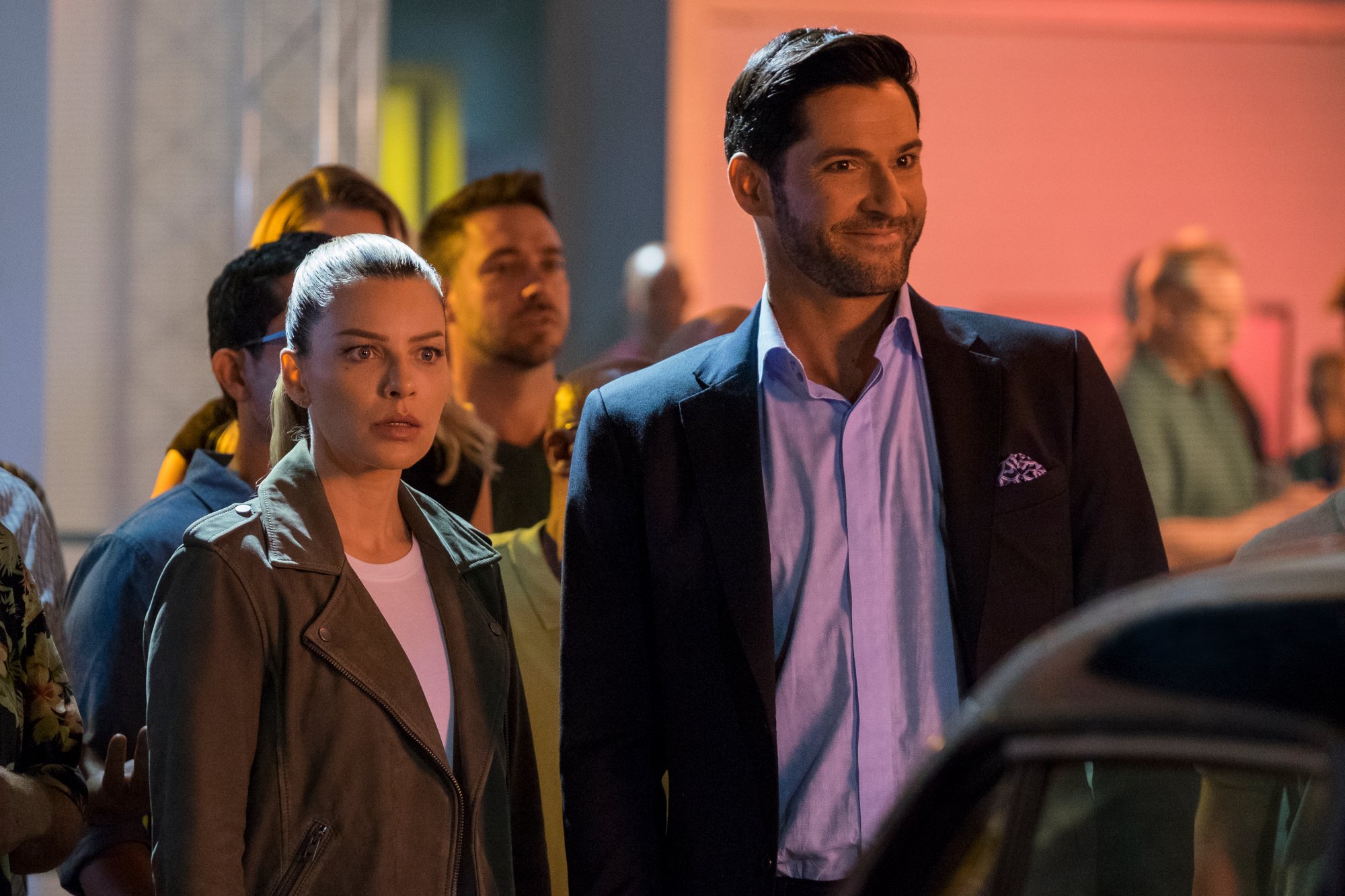 Lauren German and Tom Ellis as Chloe Decker and Lucifer Morningstar in 'Lucifer' Season 4. These 'Lucifer' episodes focus more on their relationship. Chloe looks shocked in the photo, and Lucifer looks happy about something.
