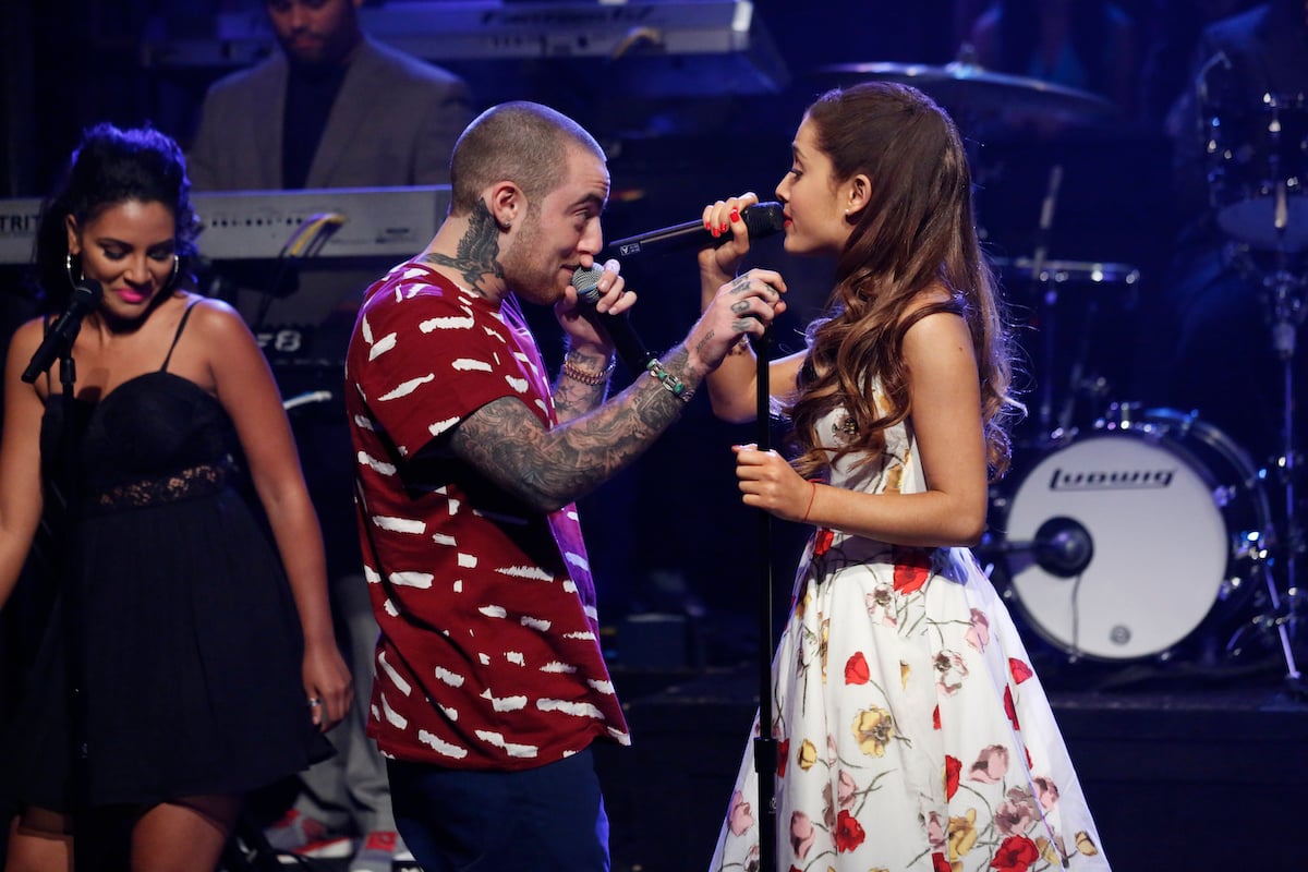 Mac Miller and Ariana Grande perform on stage together.