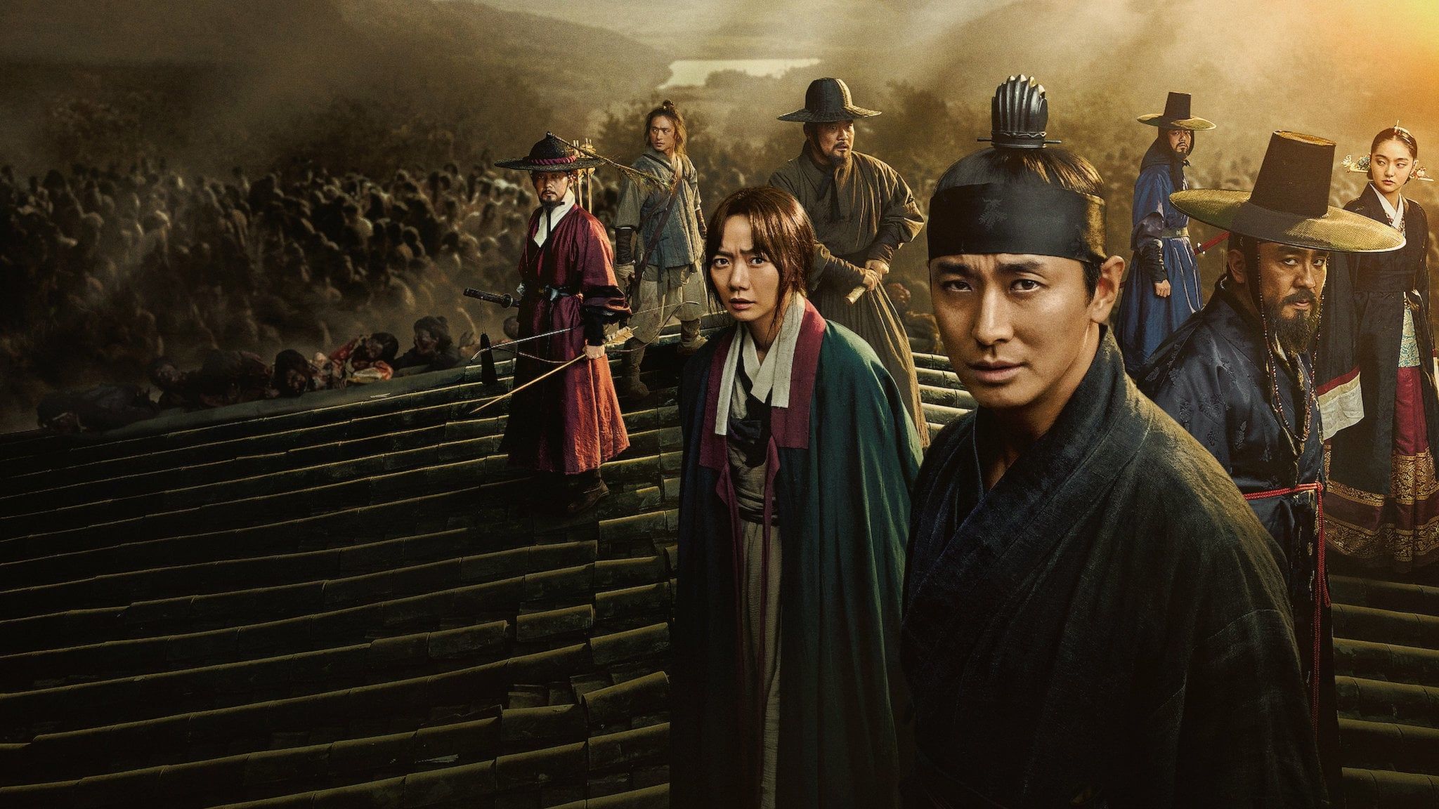 Main characters of 'Kingdom' Netflix Korean drama standing in Joseon era clothing on rooftop