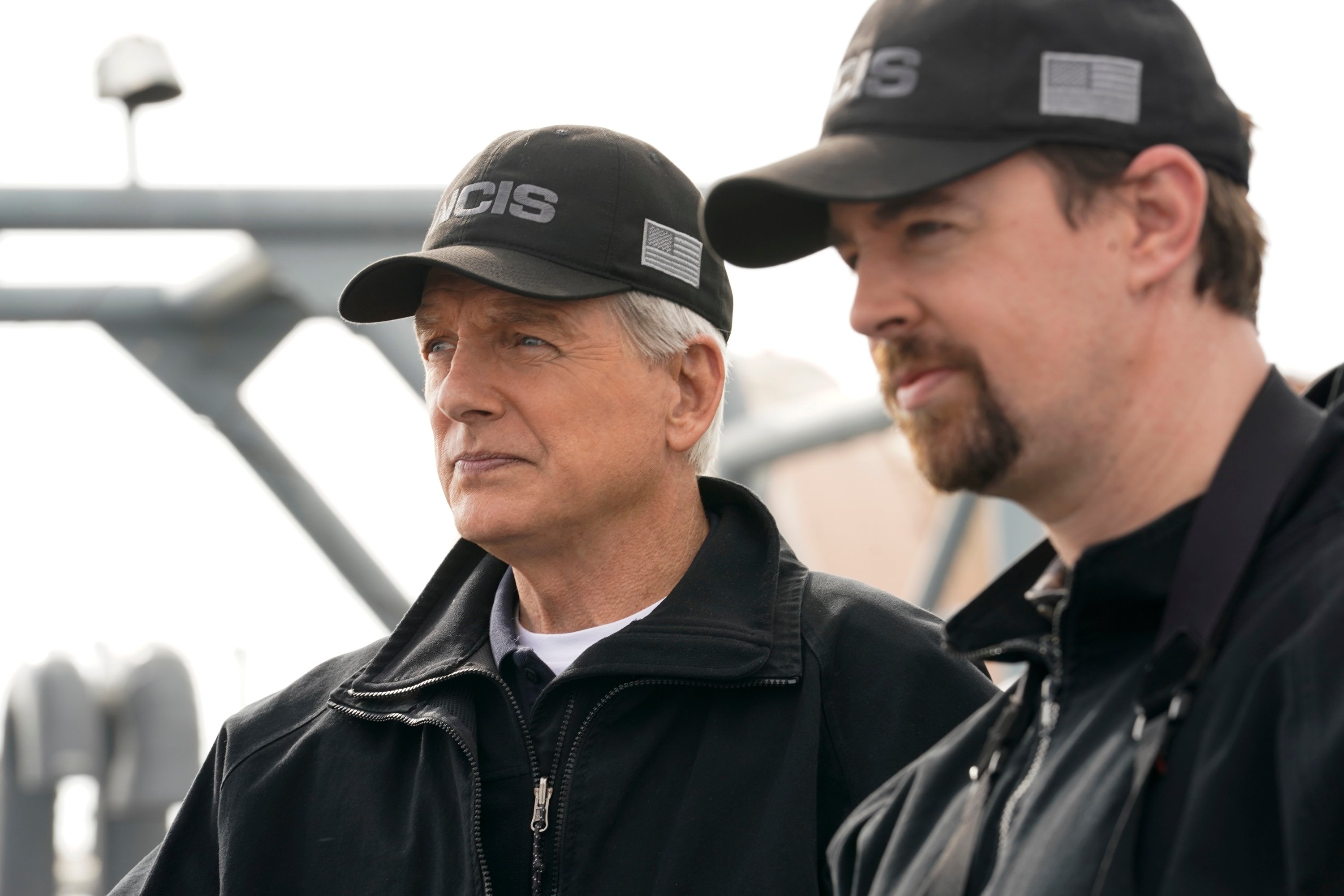 Mark Harmon and Sean Murray pose in their NCIS uniforms.