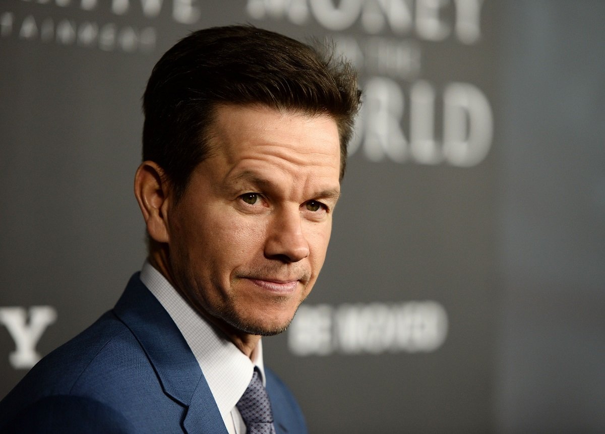 Mark Wahlberg posing in a blue suit