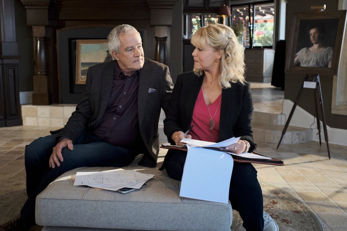 Megan holding papers and talking to a white-haired man in the 'Chesapeake Shores' Season 5 finale 