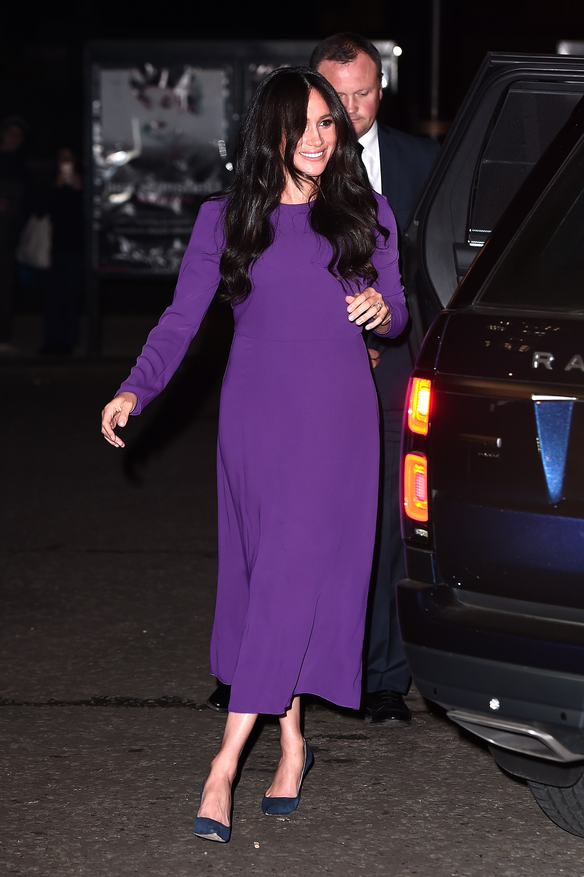 Meghan Markle dons a purple gown at the One Young World Summit