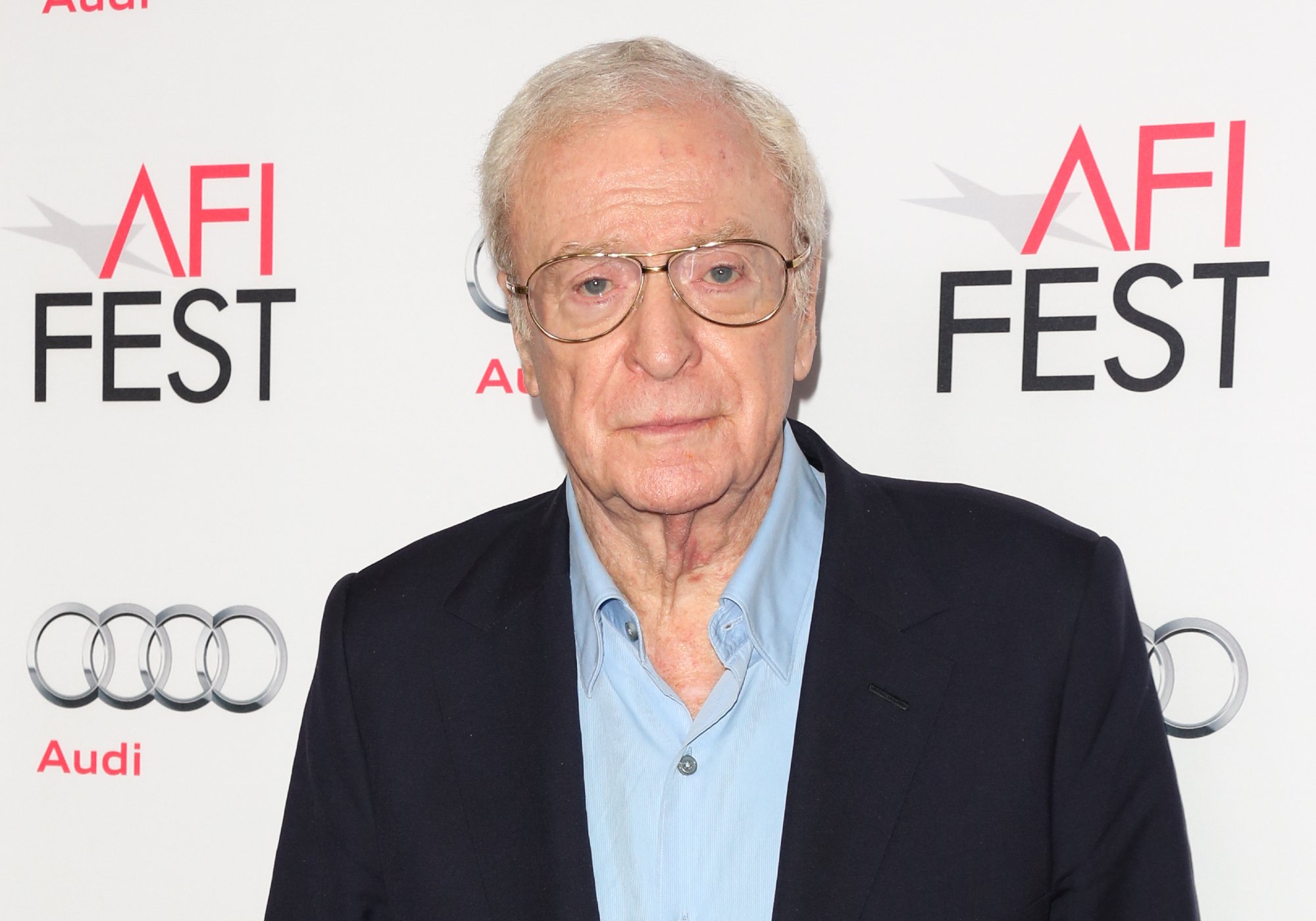 Michael Caine standing in front of the step and repeat at the 'Youth' screening at AFI Fest