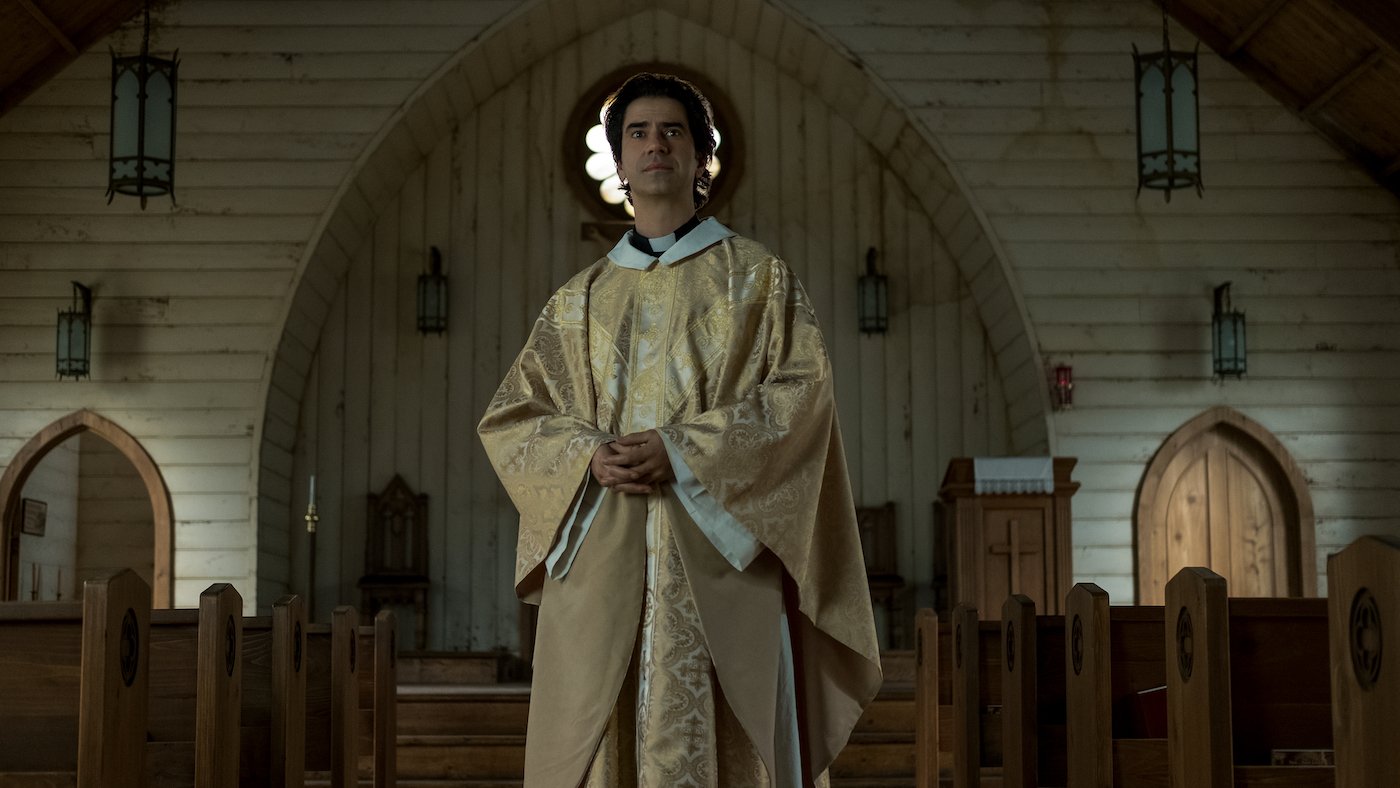 Hamish Linklater as Father Paul in a production still from the Netflix series 'Midnight Mass.'
