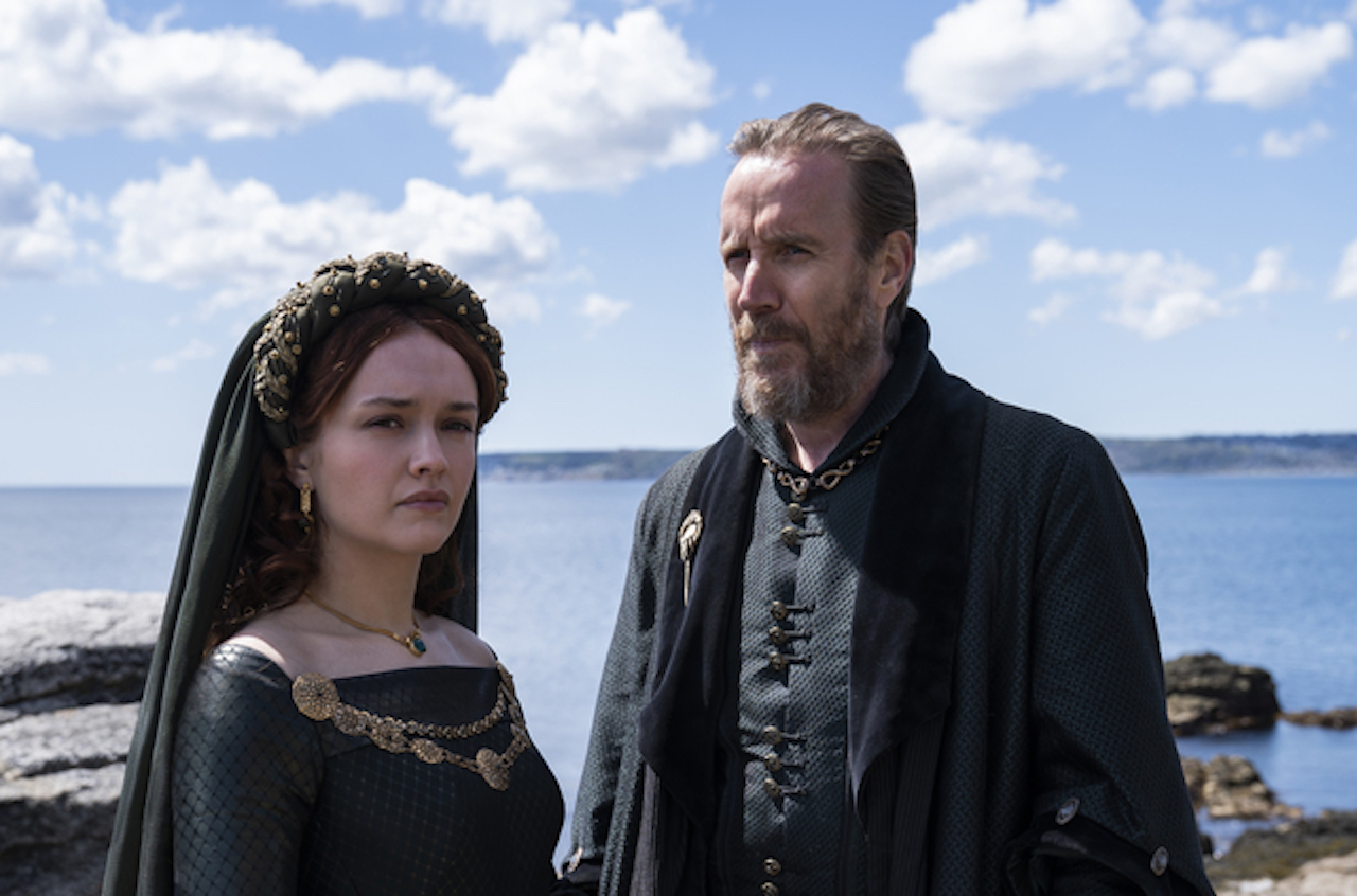 Olivia Cooke as Alicent Hightower standing next to Rhys Ifans as Otto Hightower in 'House of the Dragon'