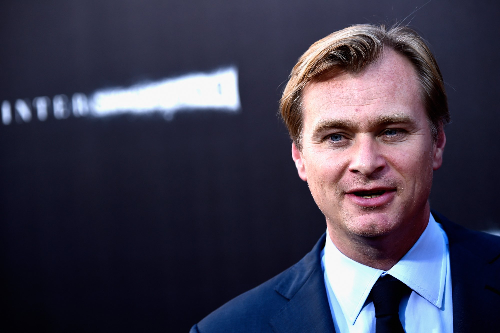 'Oppenheimer' filmmaker Christopher Nolan at the premiere of 'Interstellar' in a suit
