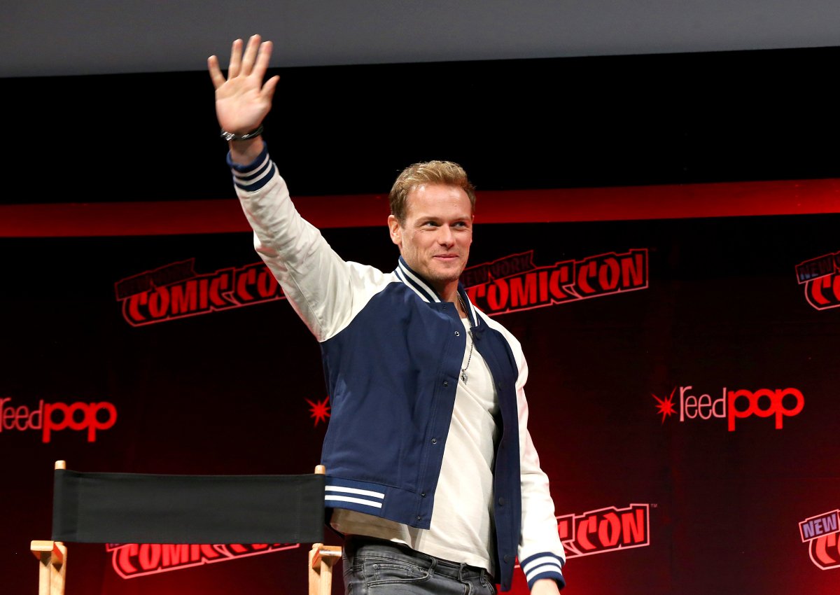 Outlander Sam Heughan appears onstage at the show’s panel during Day 3 of New York Comic Con 2021 at Jacob Javits Center on October 09, 2021