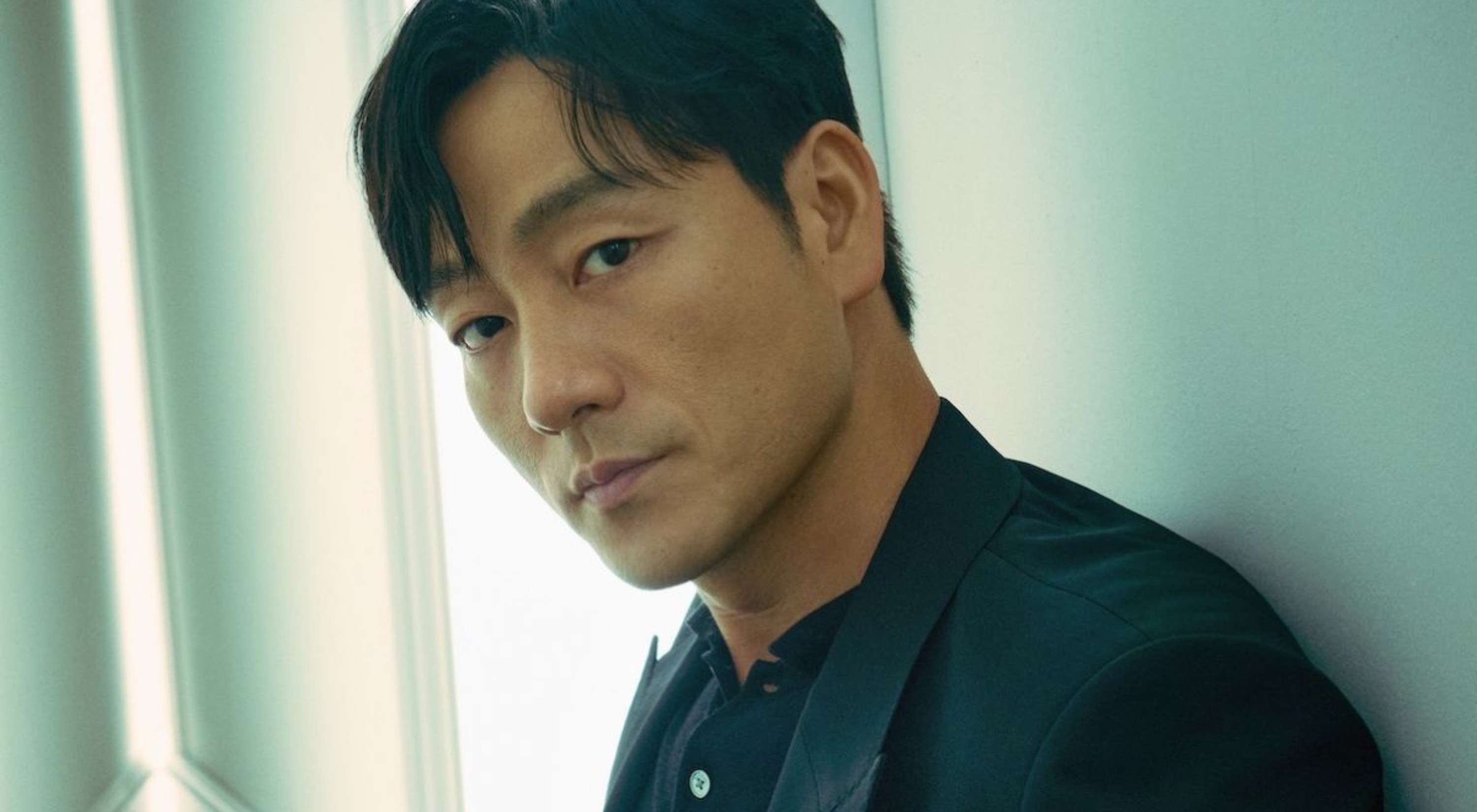 Park Hae-Soo of 'Squid Game' as Cho Sang-Woo wearing full black suit
