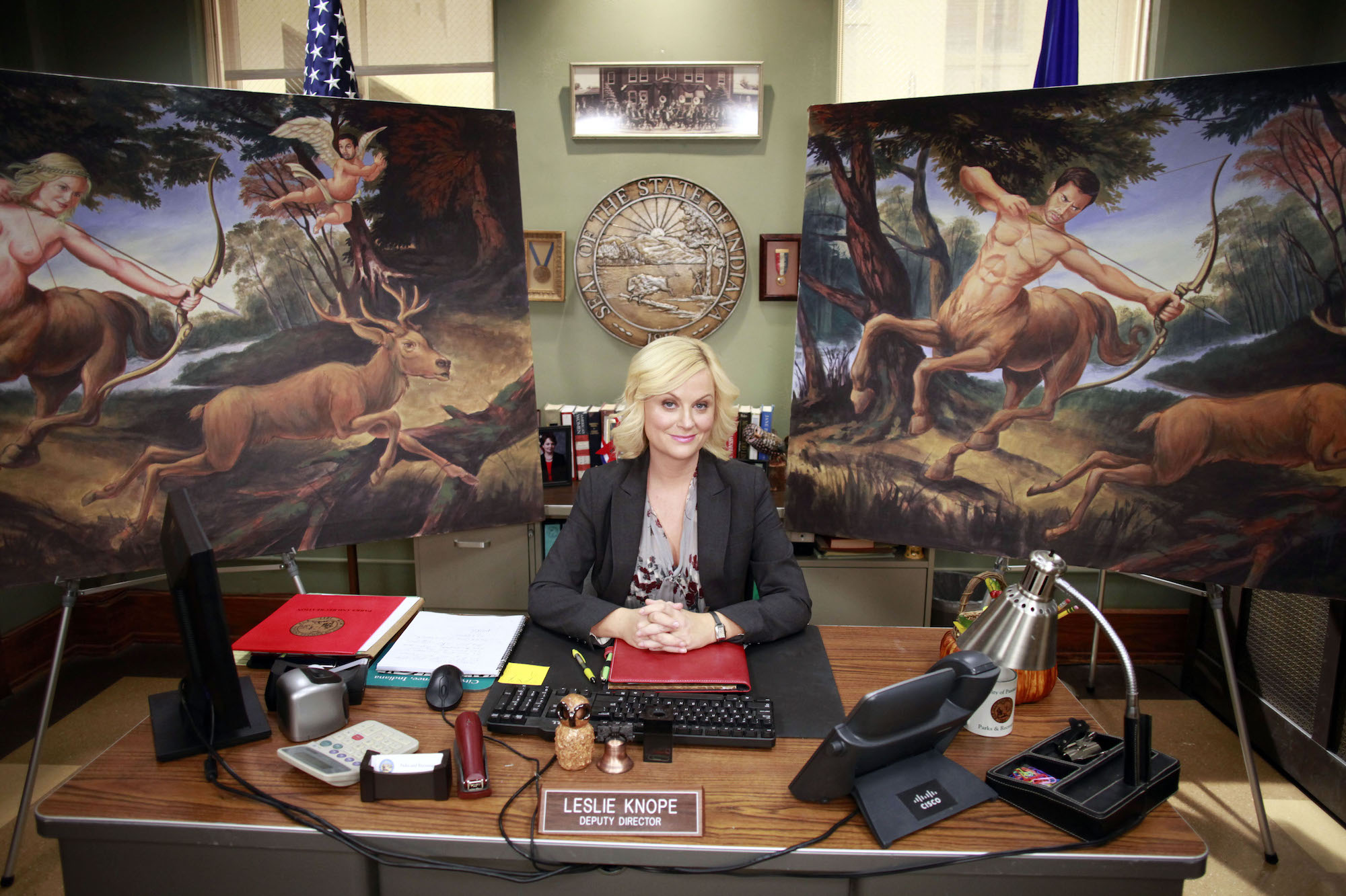 Parks and Recreation: Leslie Knope sits at her desk