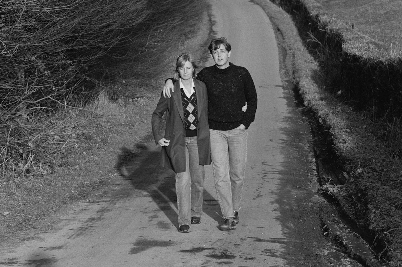 Paul and Linda McCartney taking a stroll around the English countryside, 1984.