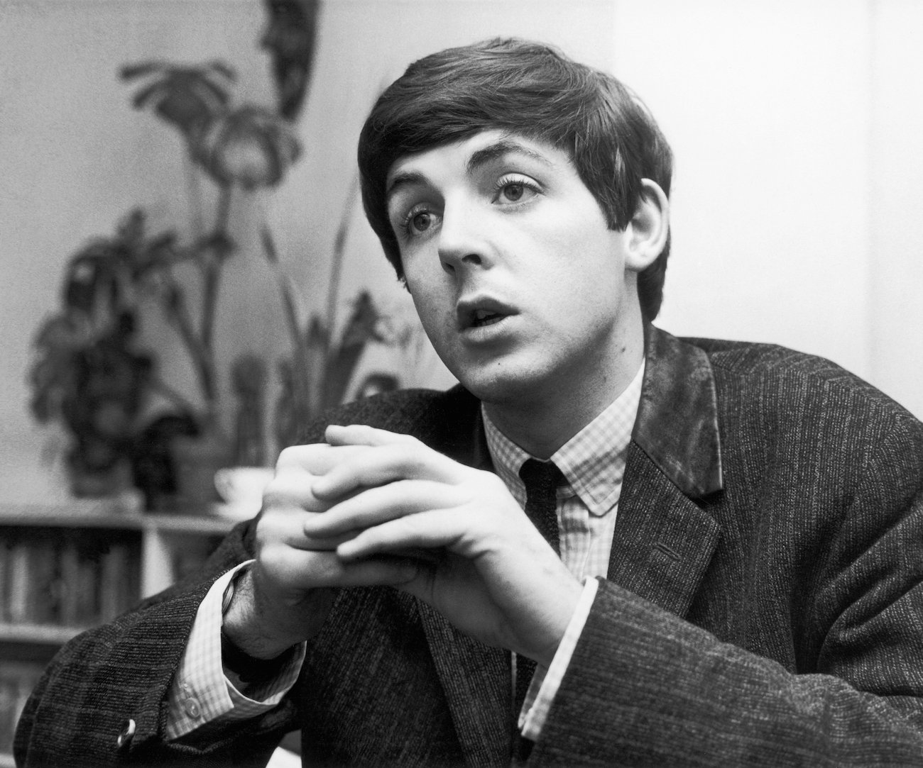 Paul McCartney in his London flat, 1963.