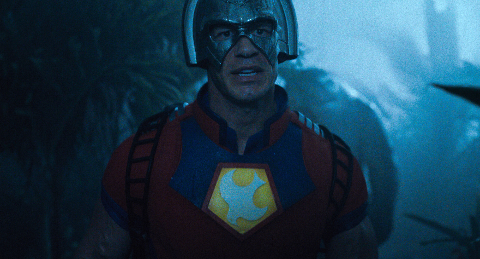 John Cena as Peacemaker in James Gunn's 'The Suicide Squad.' He's wearing his helmet and red, blue, and yellow suit.