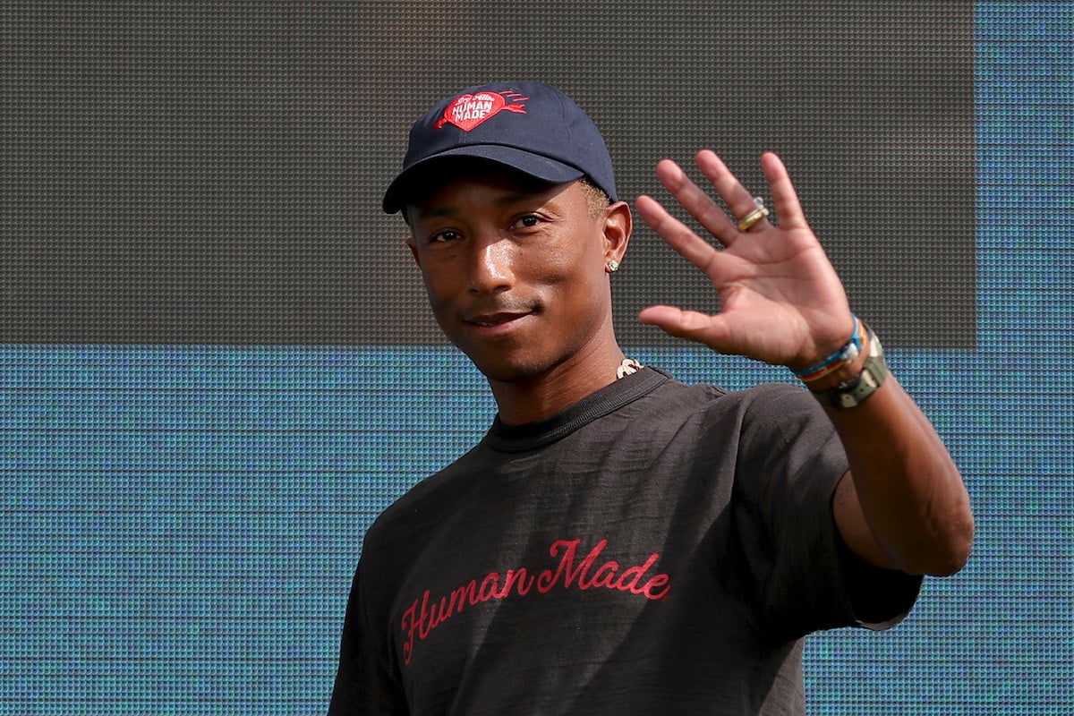 Pharrell Williams waving