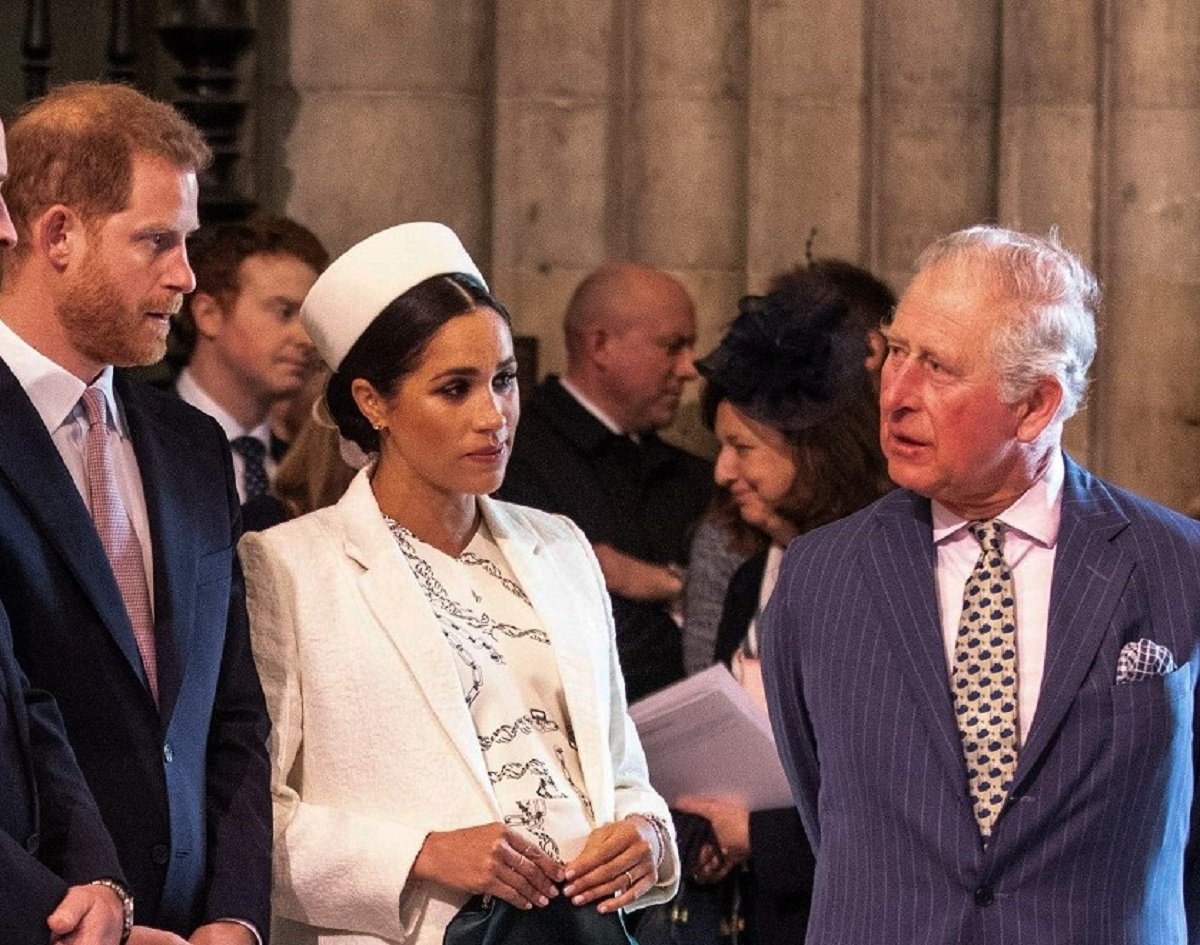 Prince Harry, Meghan Markle, and Prince Charles speaking during Commonwealth Day service in 2019