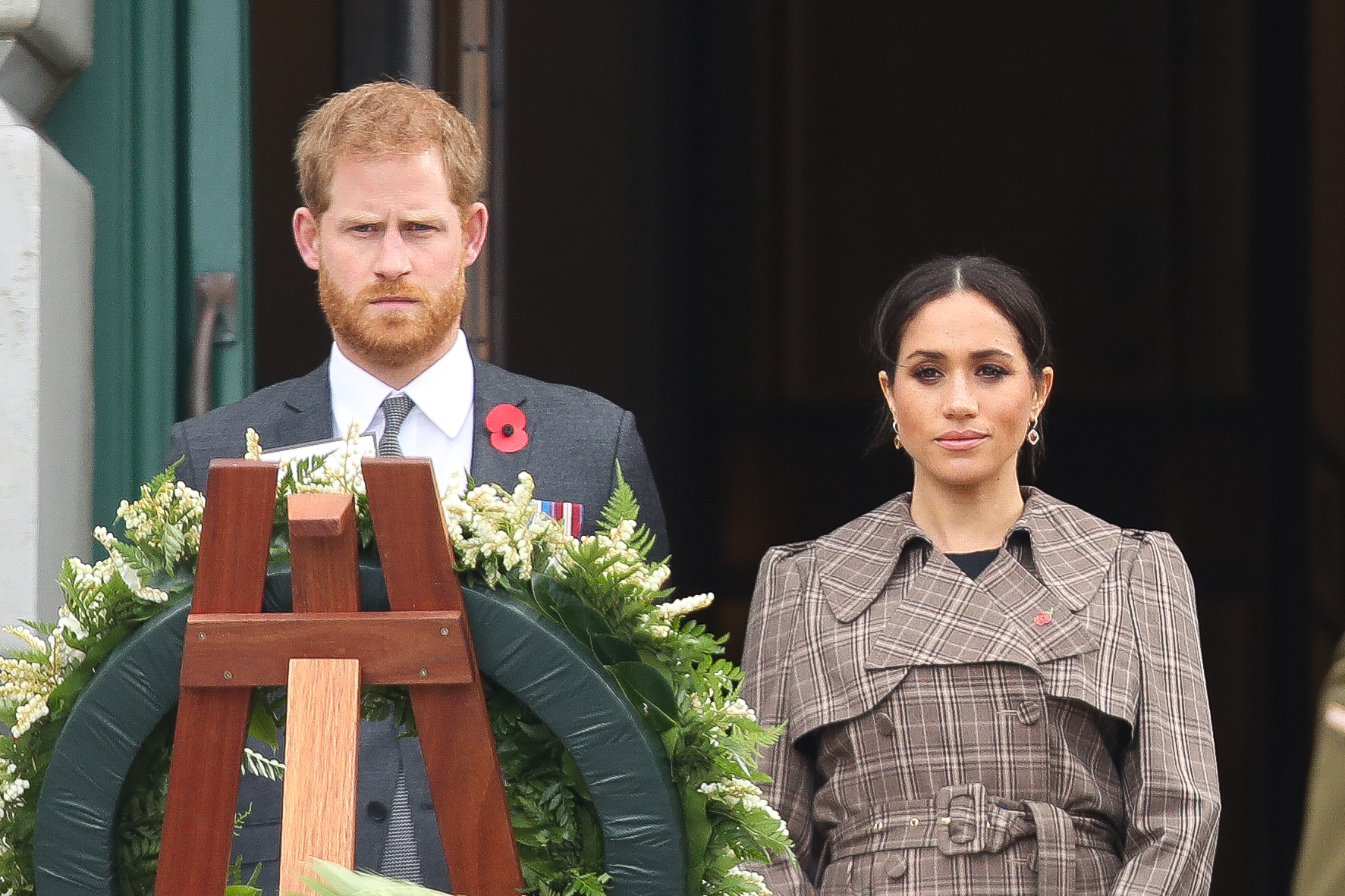 Prince Harry and Meghan Markle laying a wreath at the National War Memorial