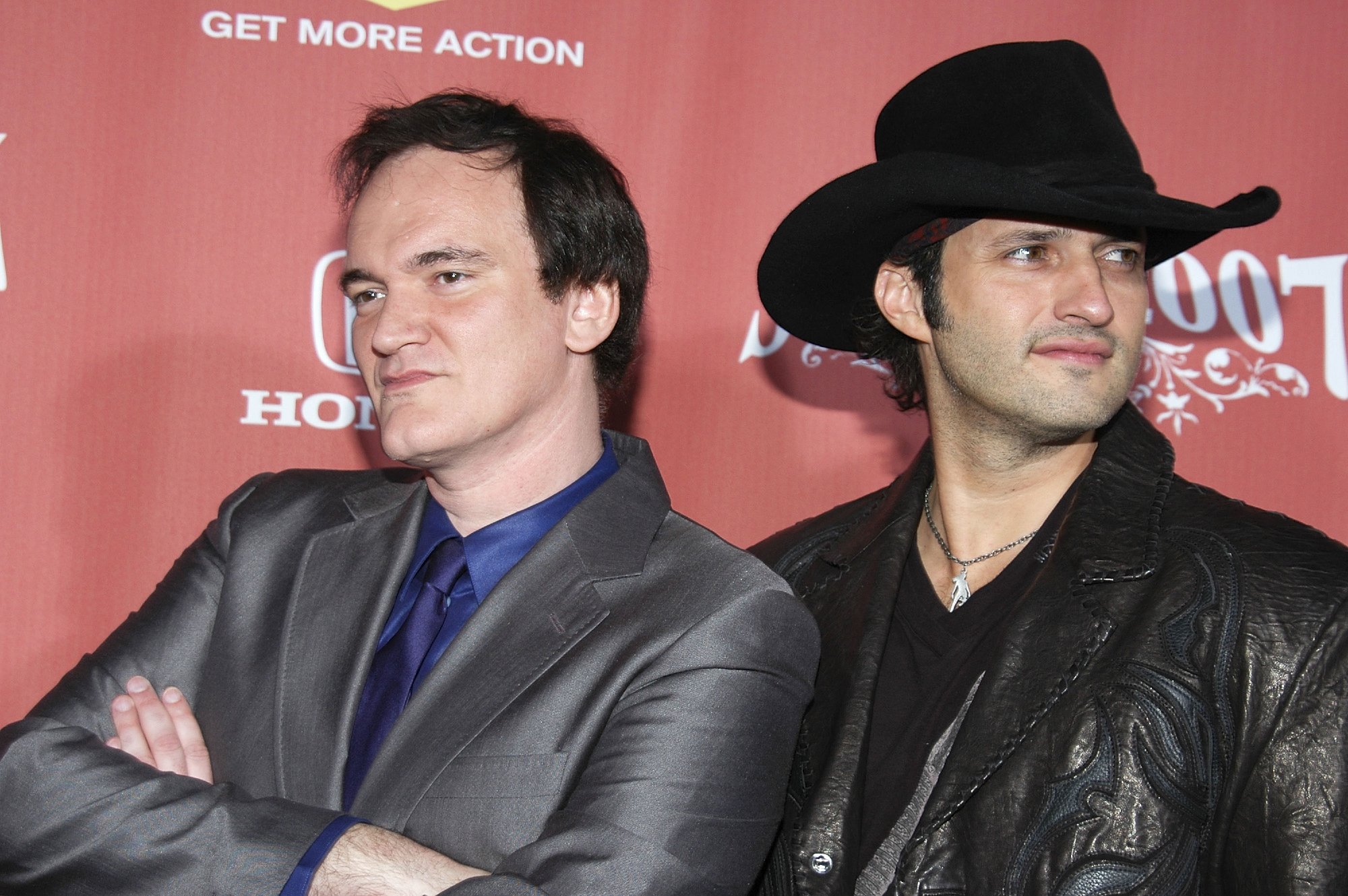 'Pulp Fiction' filmmaker Quentin Tarantino and Robert Rodriguez posing in front of a step and repeat