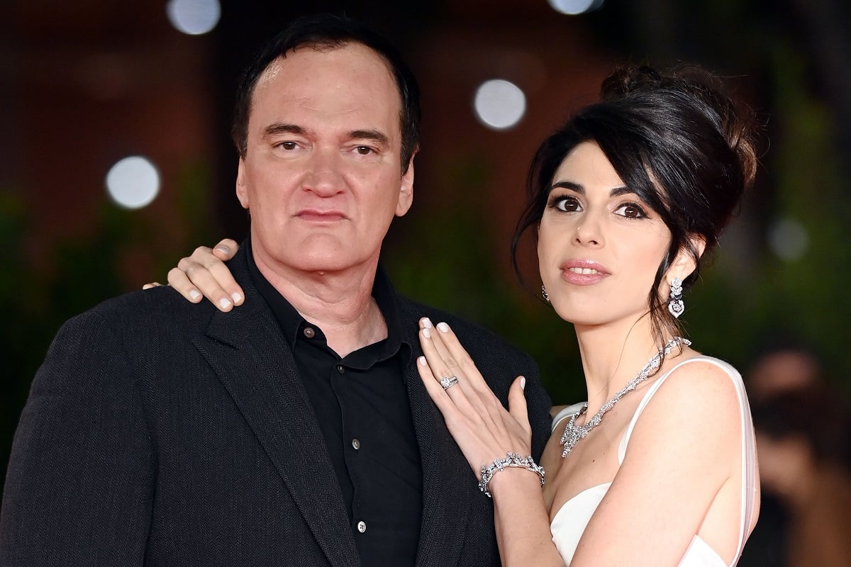 Quentin Tarantino and Daniella Pick posin