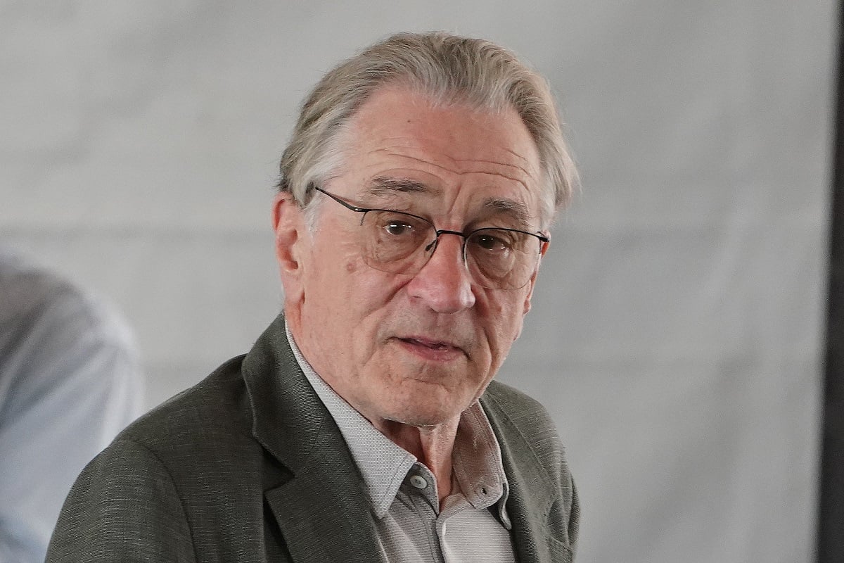 Robert De Niro focusing while wearing glasses