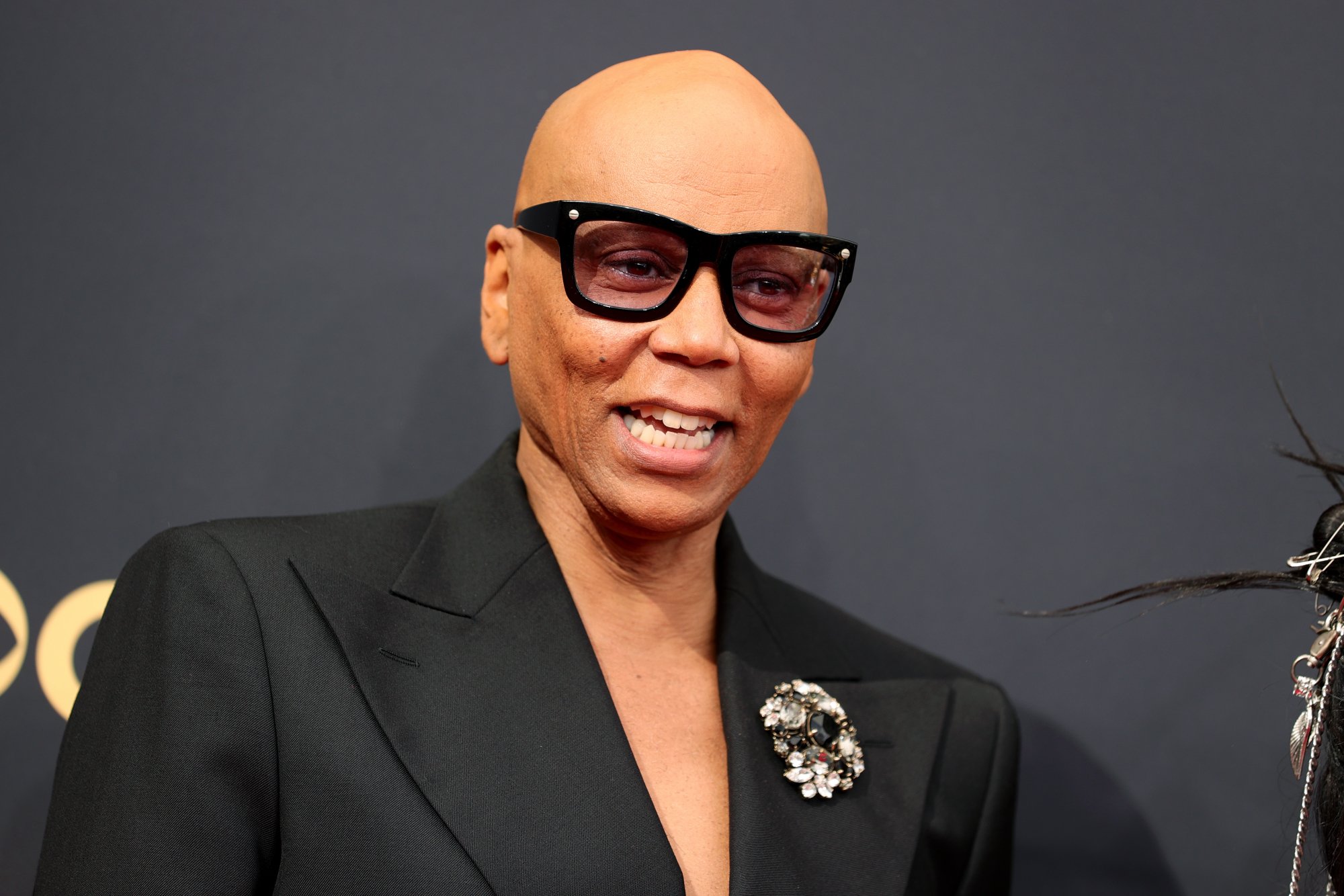'RuPaul's Drag Race' host RuPaul smiling at the 73rd Primetime Emmy Awards 