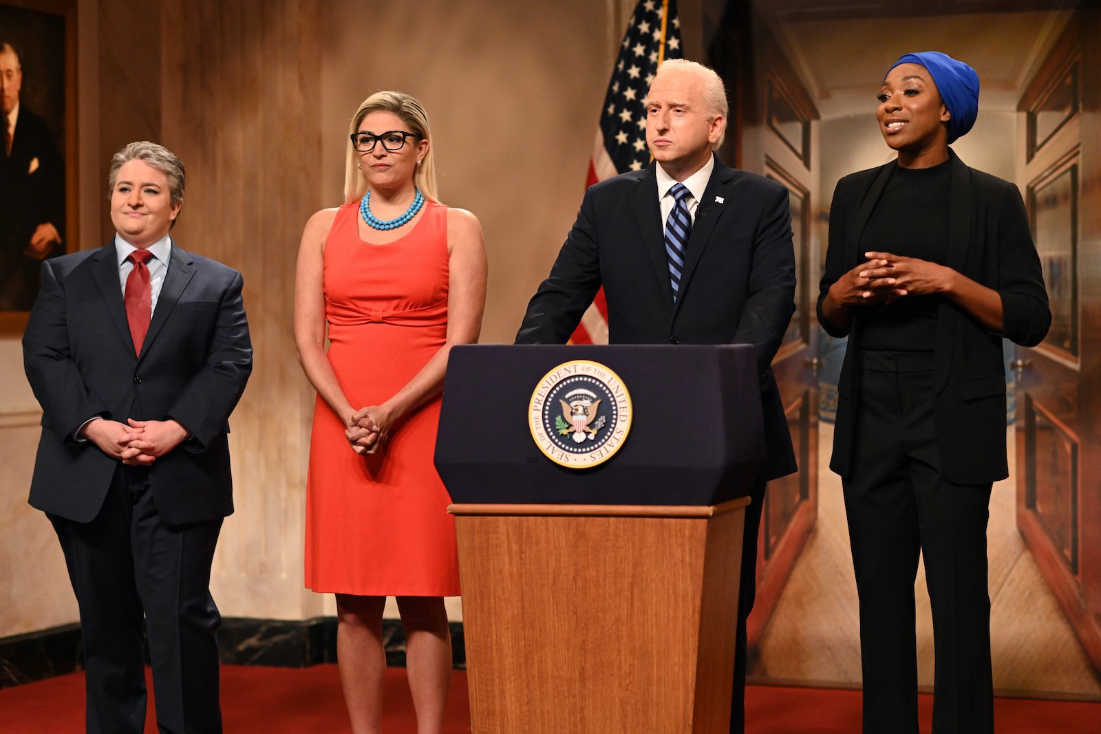 Who Played Biden on SNL? Aidy Bryant as Sen. Joe Manchin, Cecily Strong as Sen Krysten Sinema, James Austin Johnson as President Joe Biden, and Ego Nwodim as Rep. Ilhan Omar